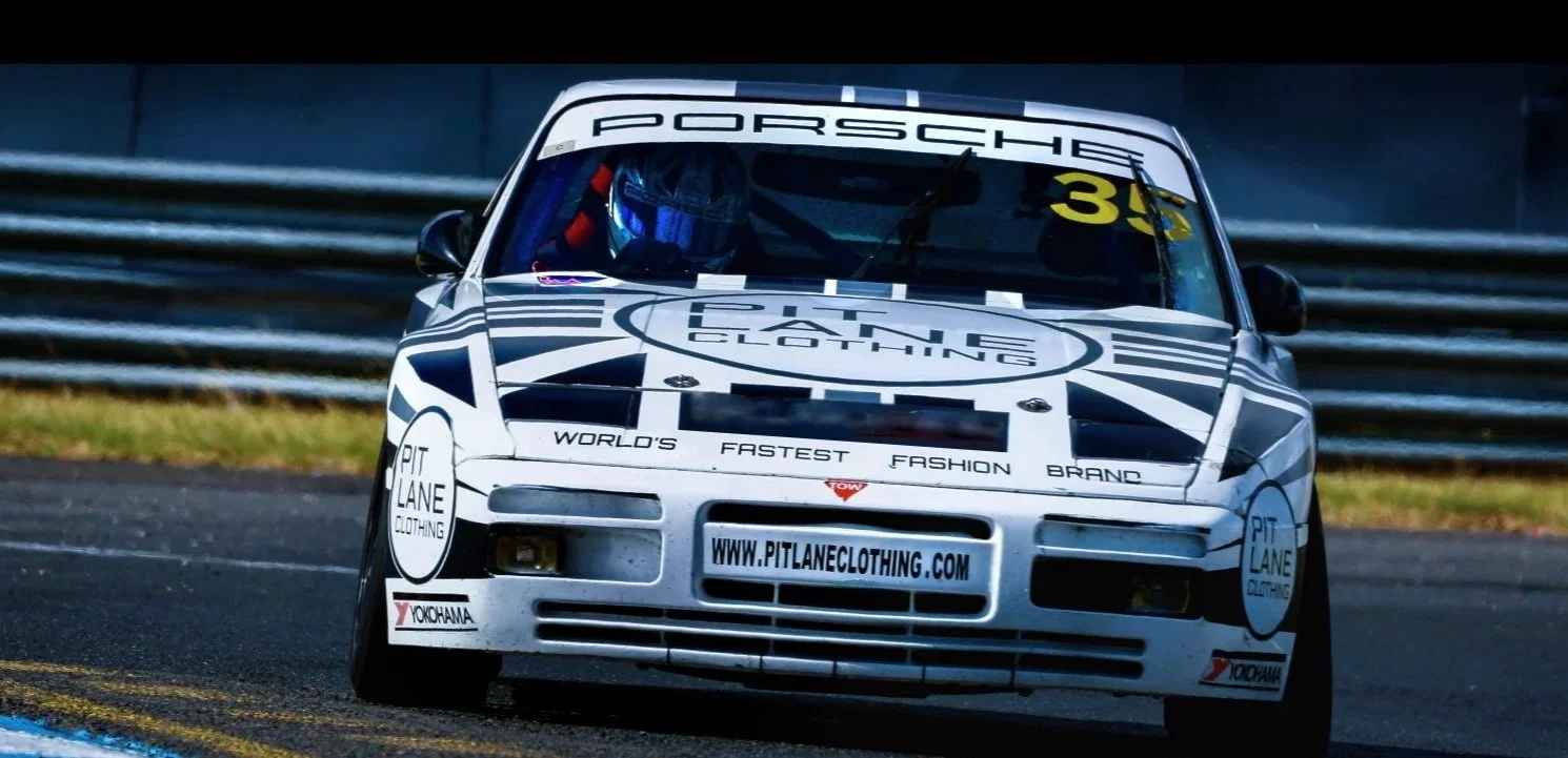 Racing car with "Pit Lane Clothing" branding and number 35.