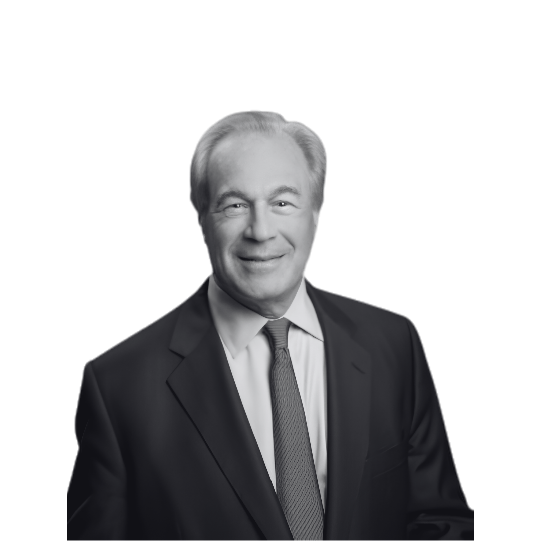 Black and white portrait of a smiling middle-aged man in a suit and tie.