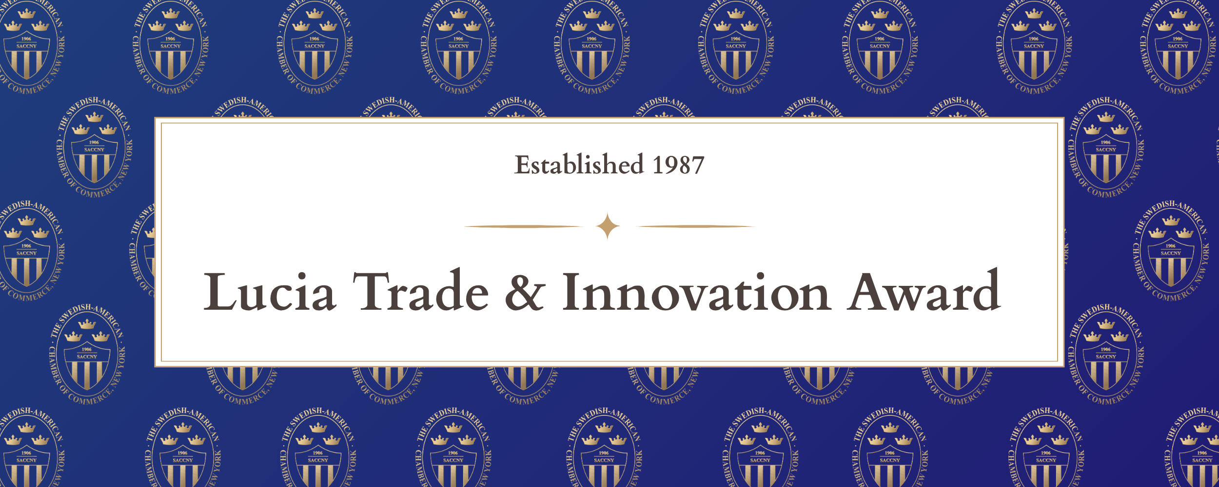 A blue background with gold and white text reading "Established 1987 Lucia Trade & Innovation Award." The background features a repeating pattern of the logo of the Swedish-American Chamber of Commerce, which includes a shield with a crown and the text "SACCNY."