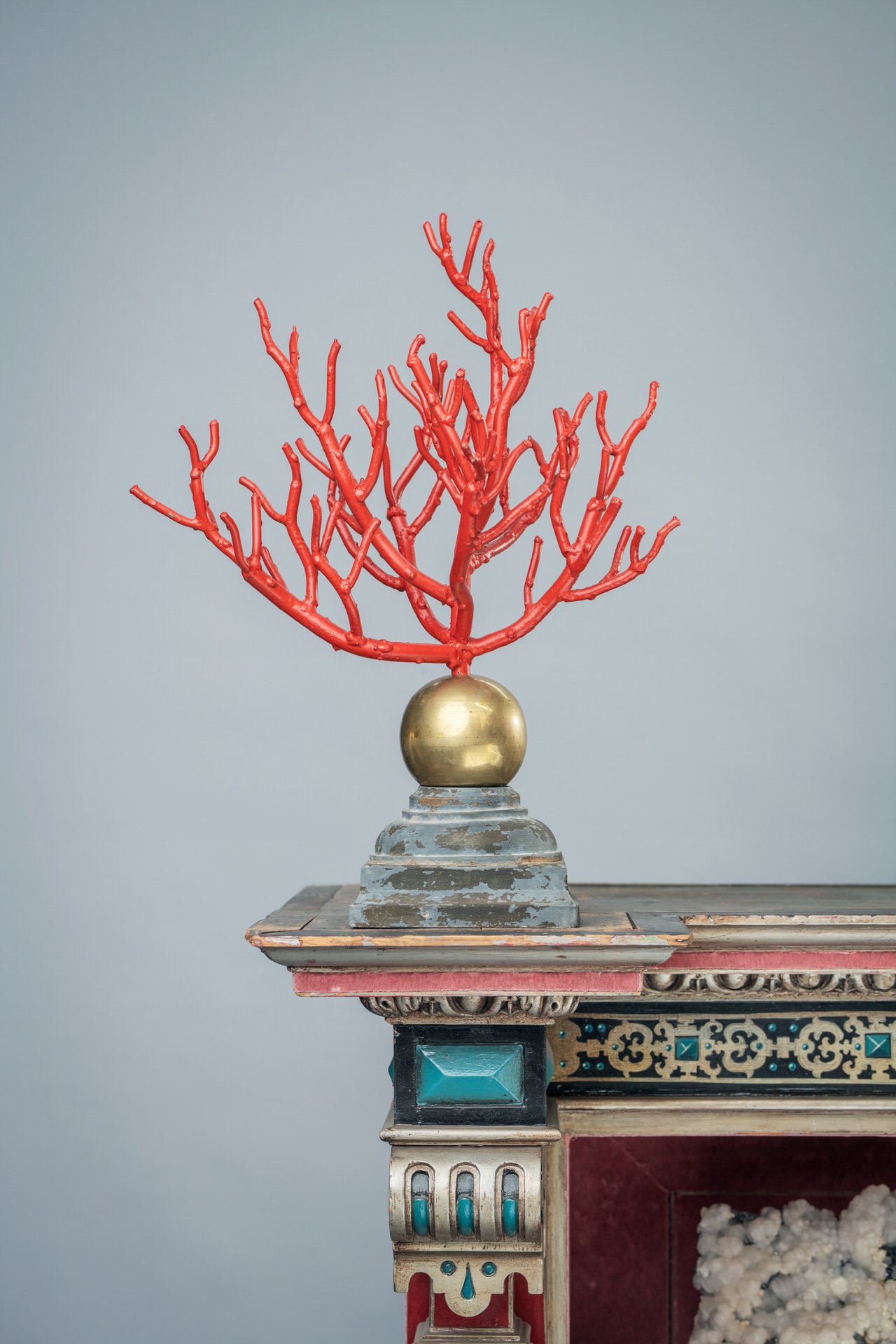 Coral display atop a cabinet filled with crystals. Photo: © Tim Mintiens