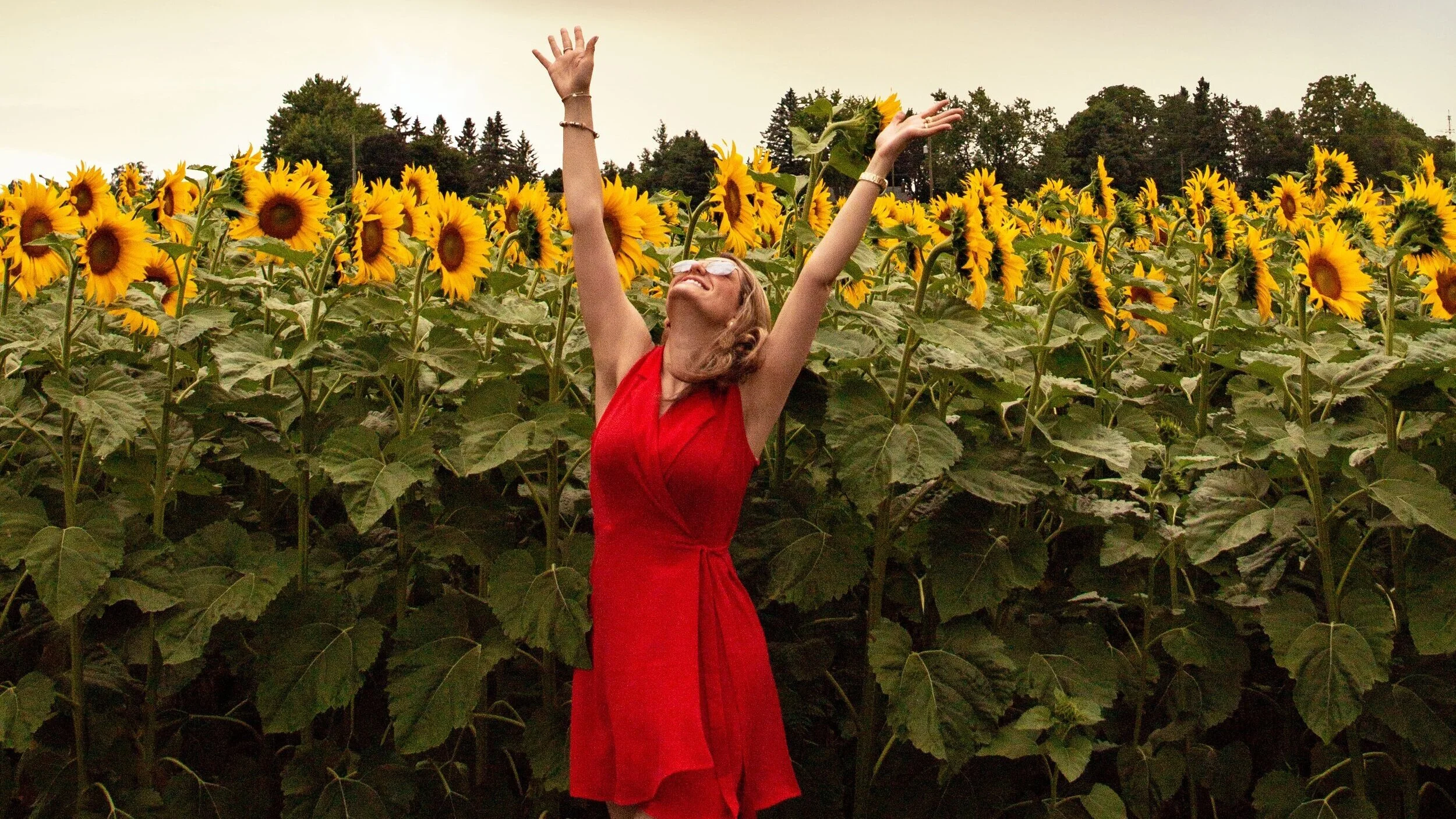 photo-of-woman-throwing-her-straw-hat-upwards-1748985.jpg