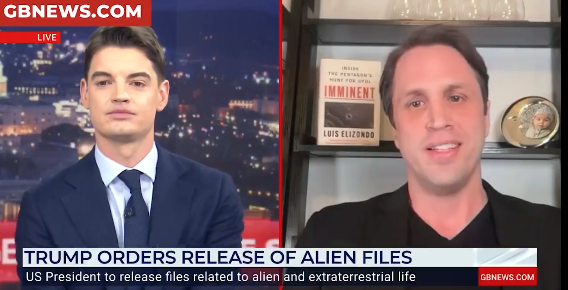 Screenshot of a news broadcast with two men talking. The left side shows a man in a suit with a cityscape background, and the right side shows another man with a bookshelf containing a book titled 'Imminent' by Luis Elizondo, and a decorative item next to it. The news headline reads "Trump Orders Release of Alien Files".