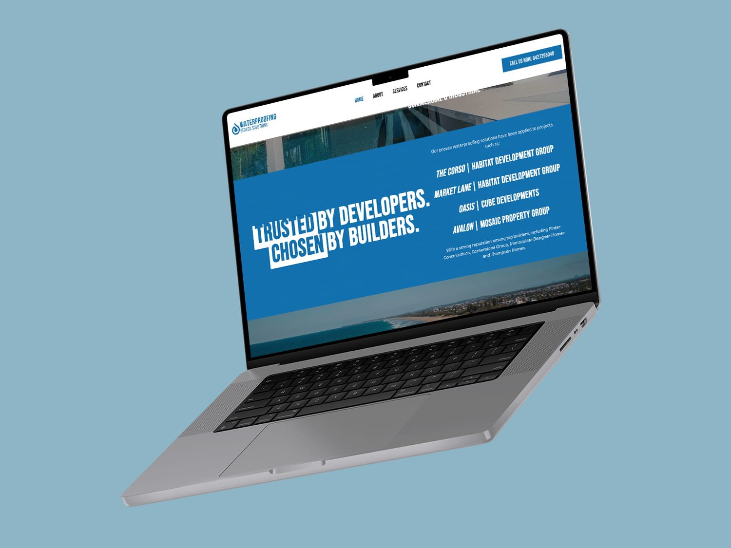 Floating laptop mockup displaying the projects page of a waterproofing website built as a professional trades website.