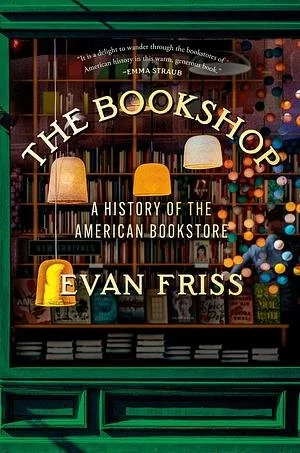 Bookstore display with books and hanging lamps, featuring the book titled 'The Bookshop: A History of the American Bookstore' by Evan Friss.