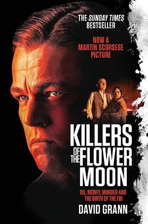 Book cover for 'Killers of the Flower Moon' featuring a close-up of a man's face on the left, with a smaller image of two people, a man and a woman, standing together on the right. The cover has black, red, and white text, highlighting its themes of 
