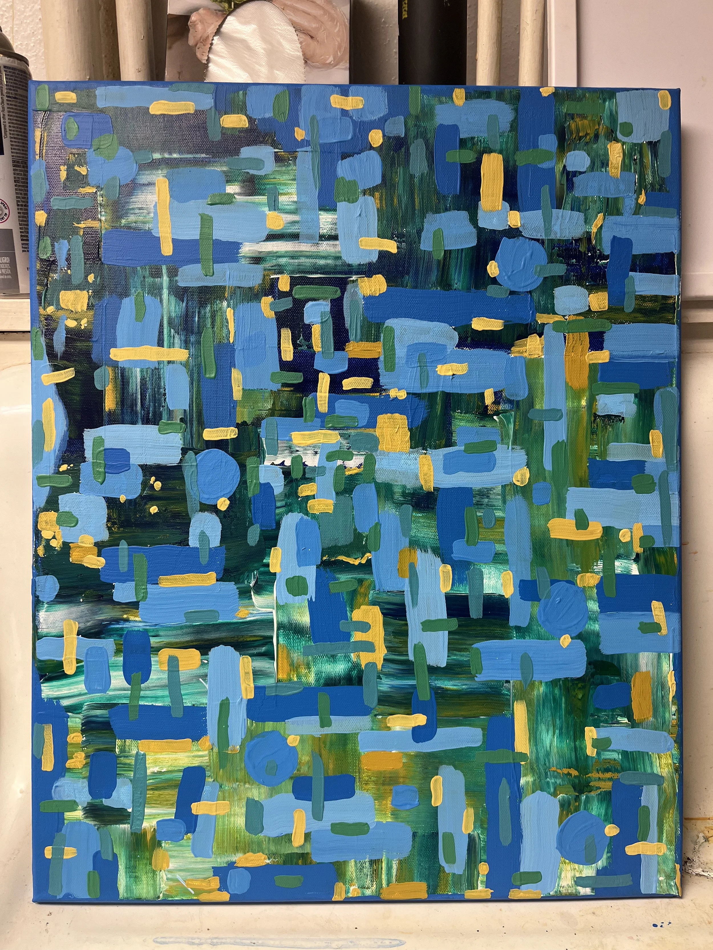 An abstract painting with blue, green, and yellow brushstrokes and rectangles.