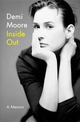 Book cover of Demi Moore's memoir titled 'Inside Out', featuring a black and white photo of Demi Moore resting her chin on her hand.