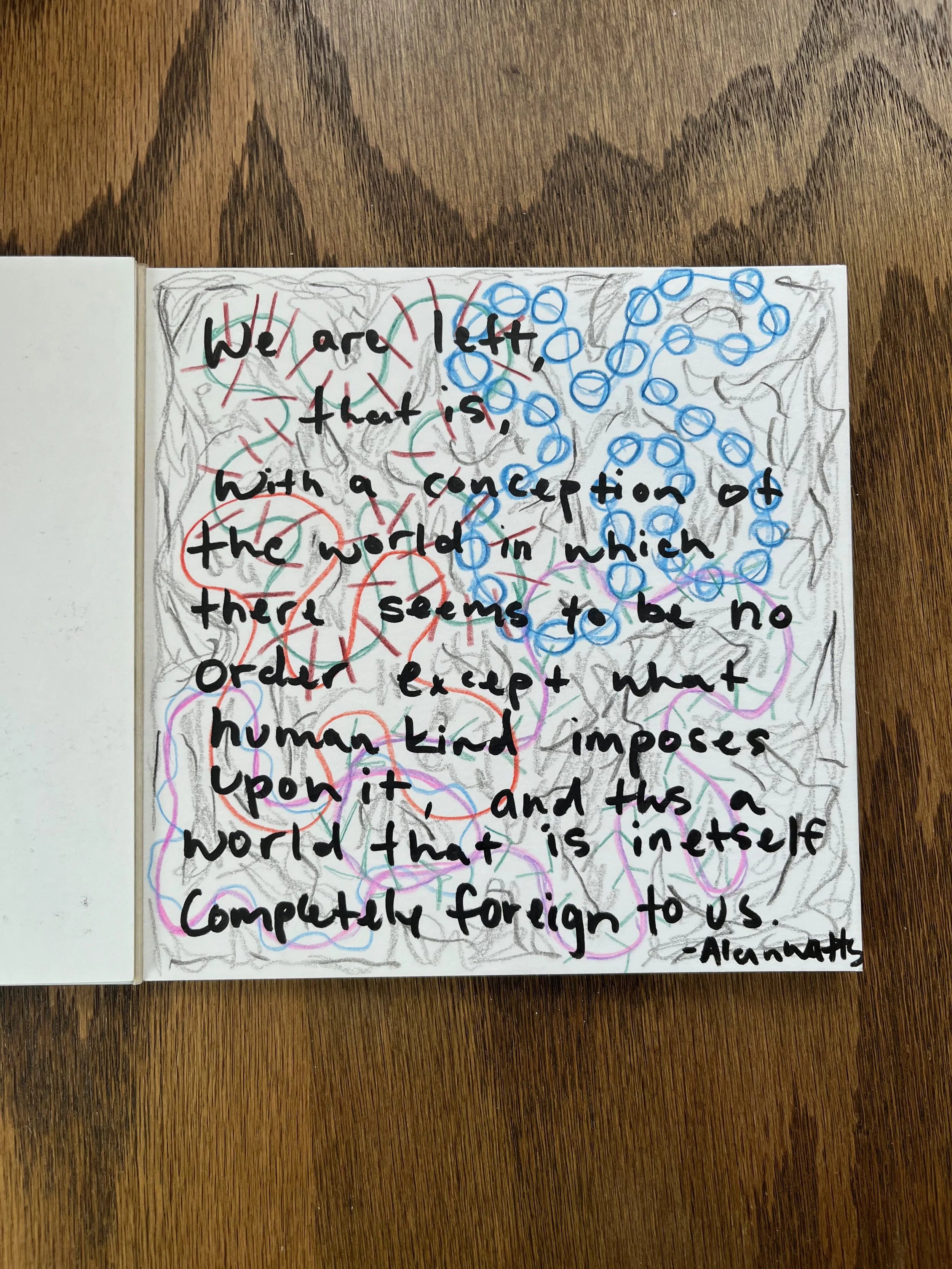 A handwritten note on a page of a book with colorful doodles and scribbles in the background. The note reads: 'We are left, that is, with a conception of the world in which there seems to be no order except what human mind imposes upon it, and thus a