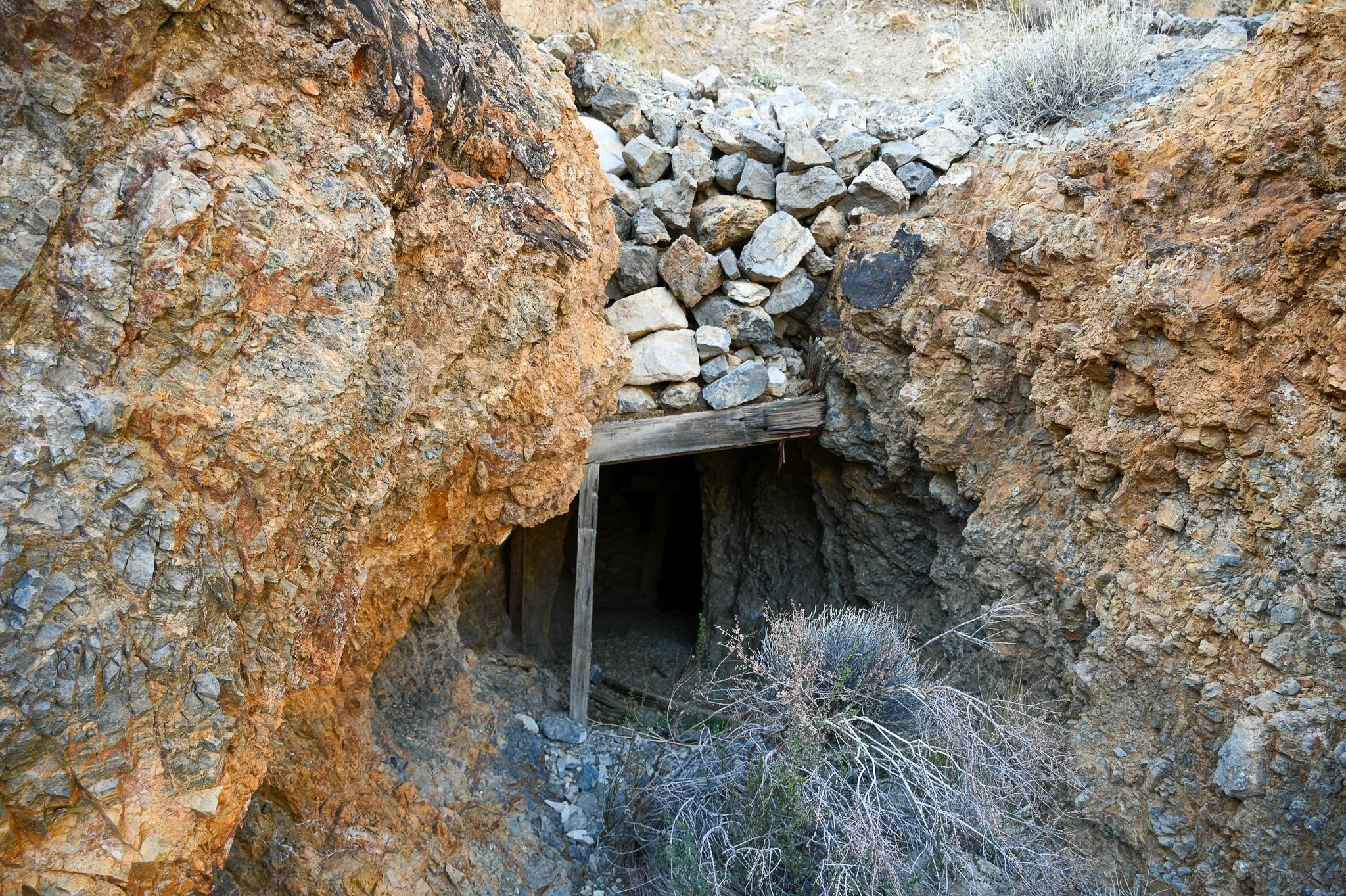  Looking into one of the main adits at the Lemoigne Mine. Despite appearances, this adit is NOT safe to enter as that cap is about to collapse. 