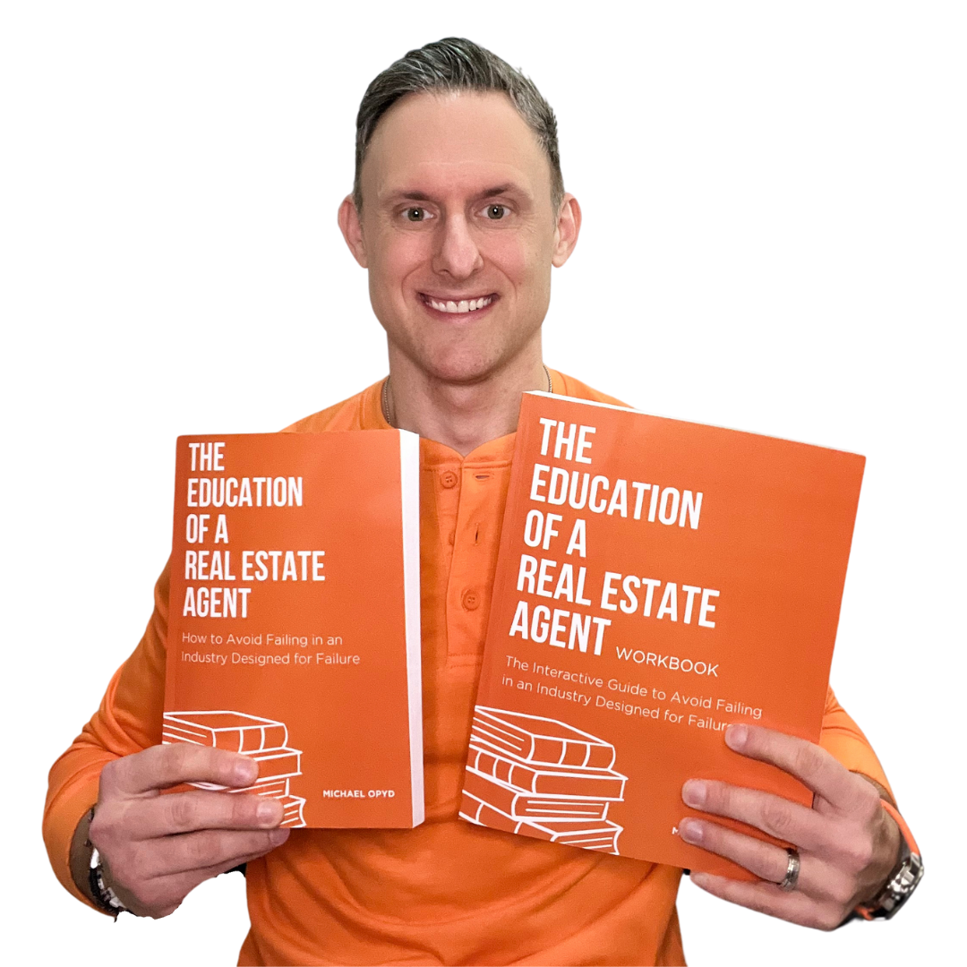 A man smiling and holding two books titled "The Education of a Real Estate Agent" in orange covers; one is a workbook and the other is a guide.