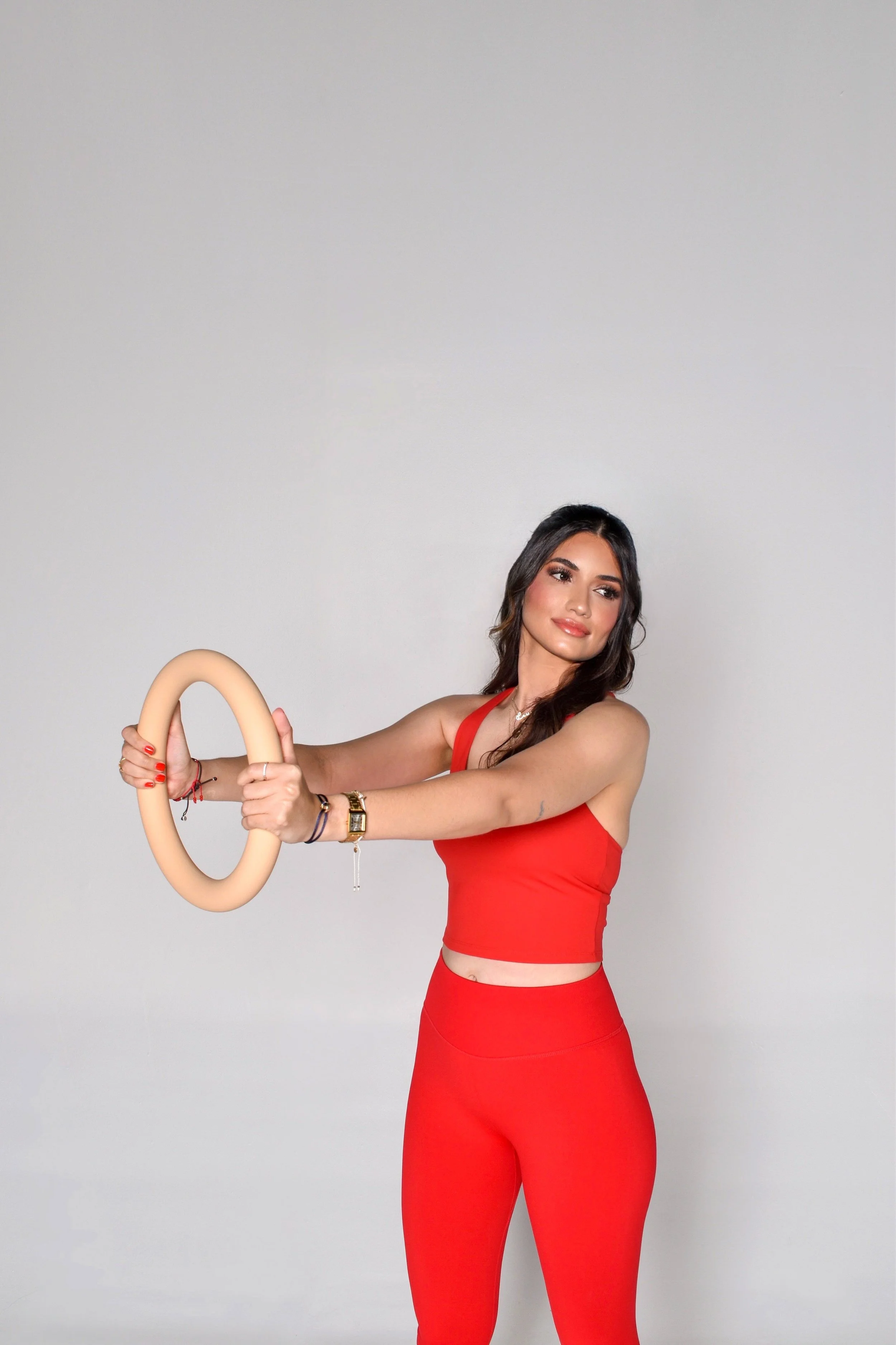 I'm Lorena, a certified Pilates instructor passionate about wellness. I help others build strength, flexibility, and mindfulness to feel empowered and reach their fitness goals.