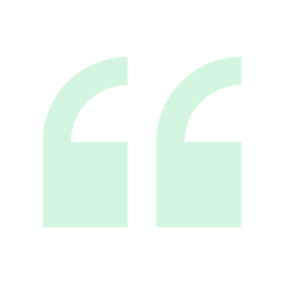 Green quotation marks on a black background