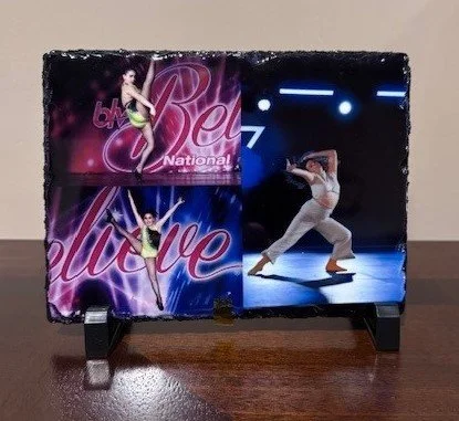 A collage on a small stand featuring two images of a gymnast in a green leotard and a photo of a person performing a dance move. The collage includes the words "Barbie" and "elite."
