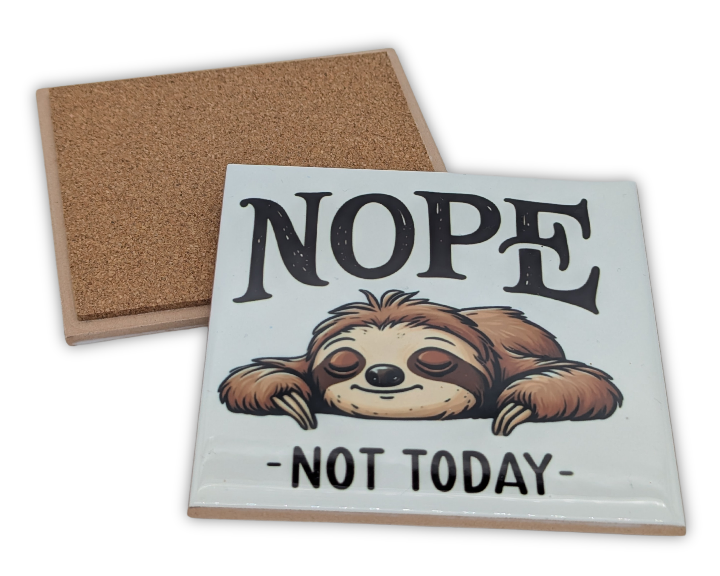 A square corkboard with a white ceramic tile featuring a sleeping sloth and the words 'NOPE - NOT TODAY' in bold black letters.