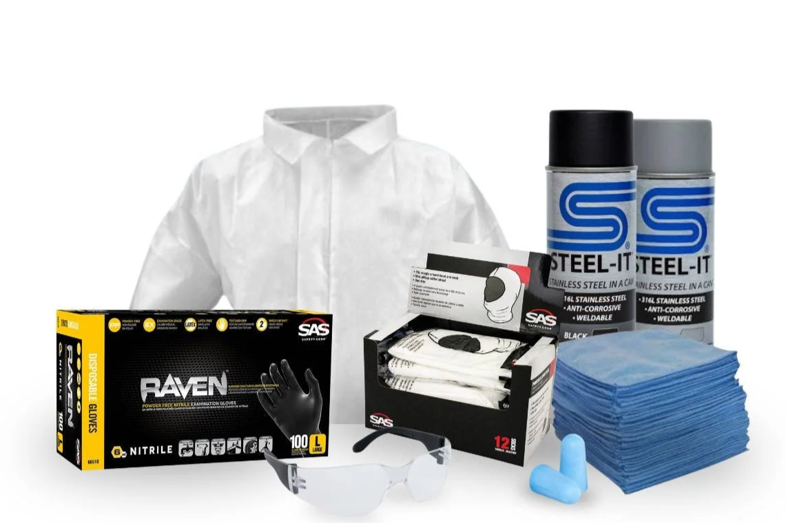 Wide assortment of industrial coatings products and application equipment from multiple manufacturers displayed together, including protective equipment such as safety gloves, coverall, eye protection, and cleaning supplies.