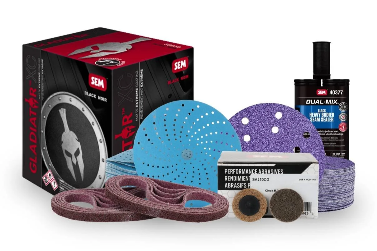 Group display of SEM Products industrial coating and maintenance solutions including abrasives, aerosols, seam sealers, body filler, rust prevention coatings, detailing products, and repair materials used in manufacturing