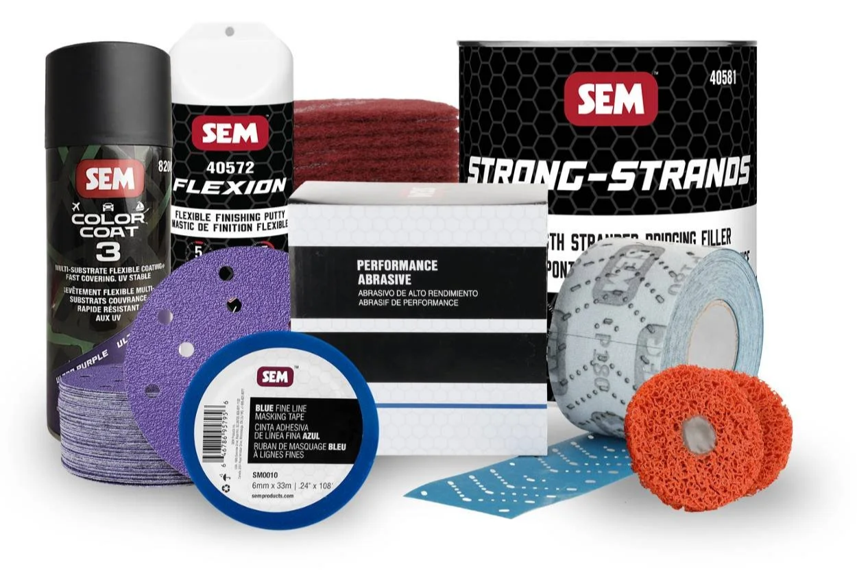 SEM auto body repair and refinishing materials shown together, featuring aerosol paints, seam sealers, body filler, detailing products, rust prevention coatings, and undercoating solutions for collision repair professionals.