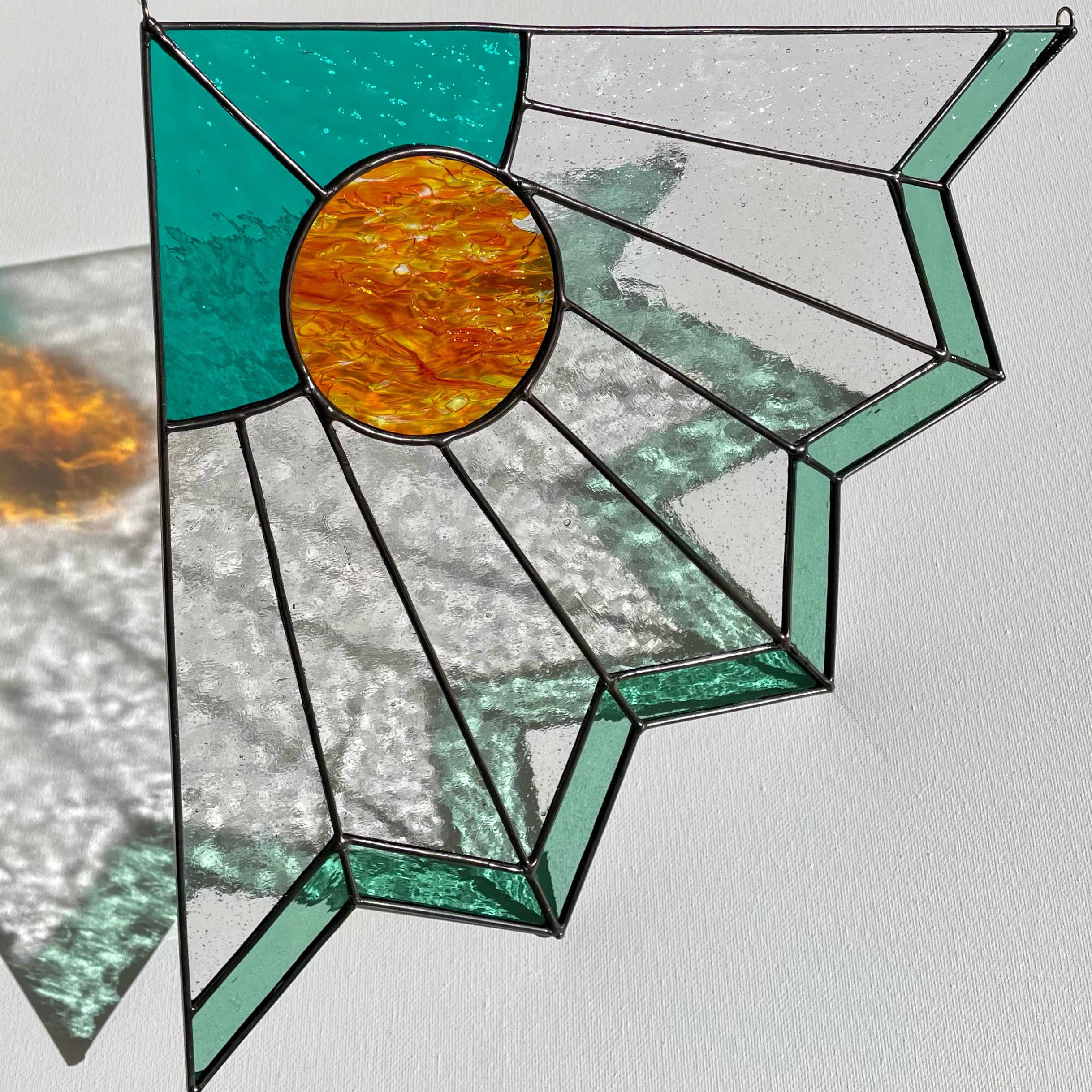 SecretGlassAgency-deco-corner-teal-orange.jpg