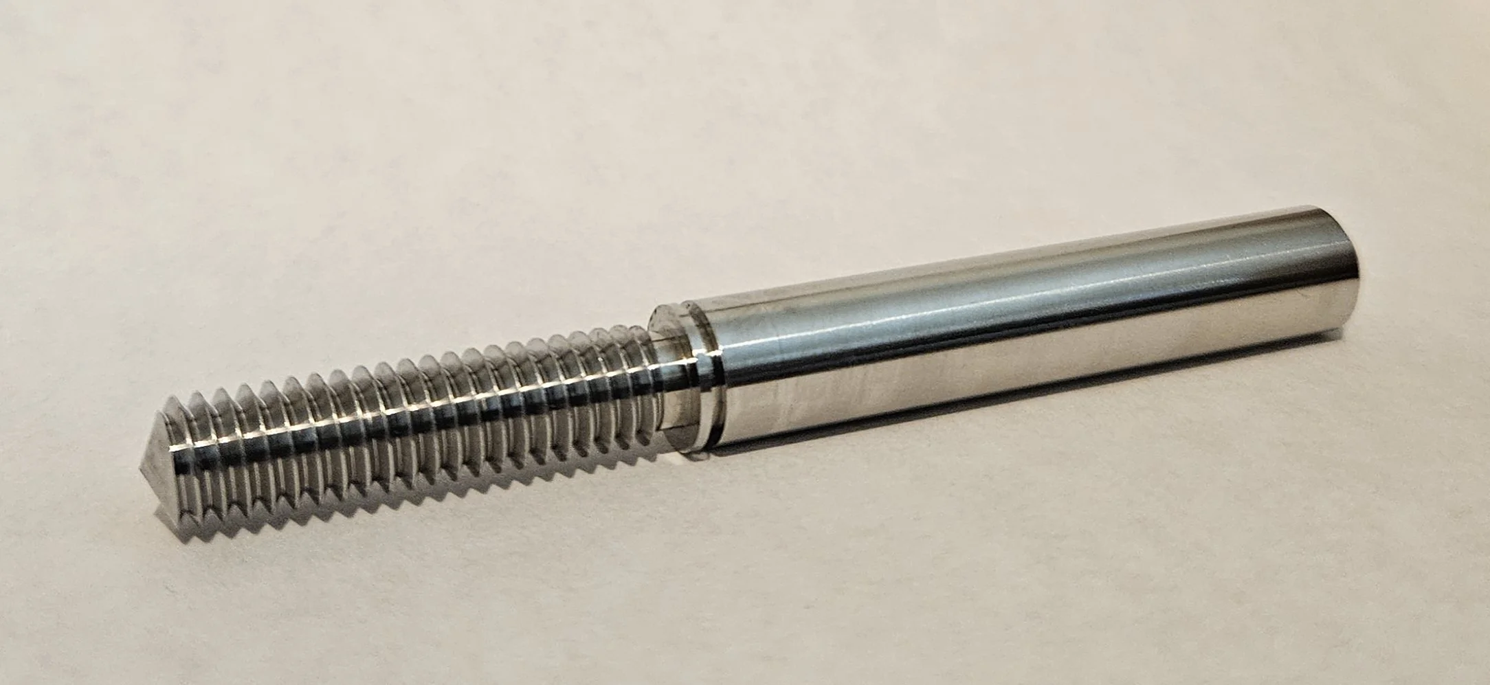 Custom Swiss machined threaded pin featuring precision external threads and tight-tolerance turned diameters. Designed for reliable fitment and repeatable production quality