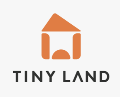 Logo of Tiny Land, demonstrating their play-based store for children.