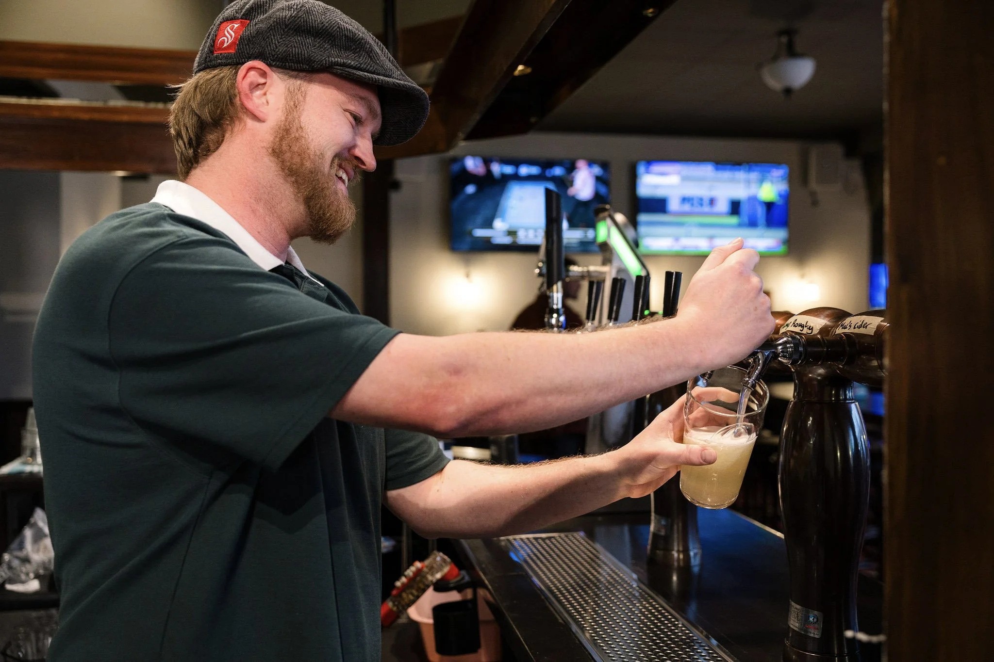 Bartender pouring beer