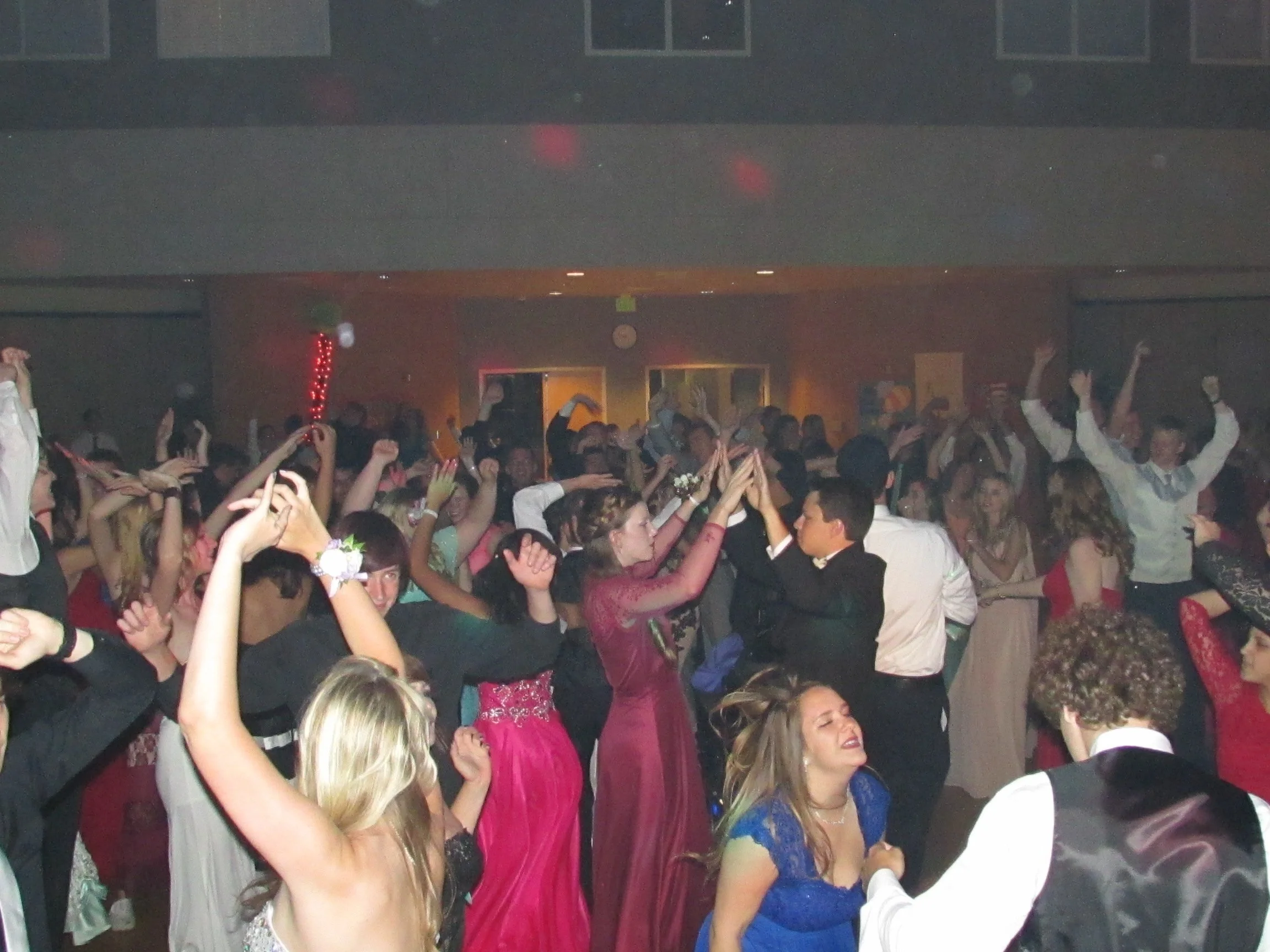 Teenagers dancing at school event with celebrations with DJ in San Diego making timeless events