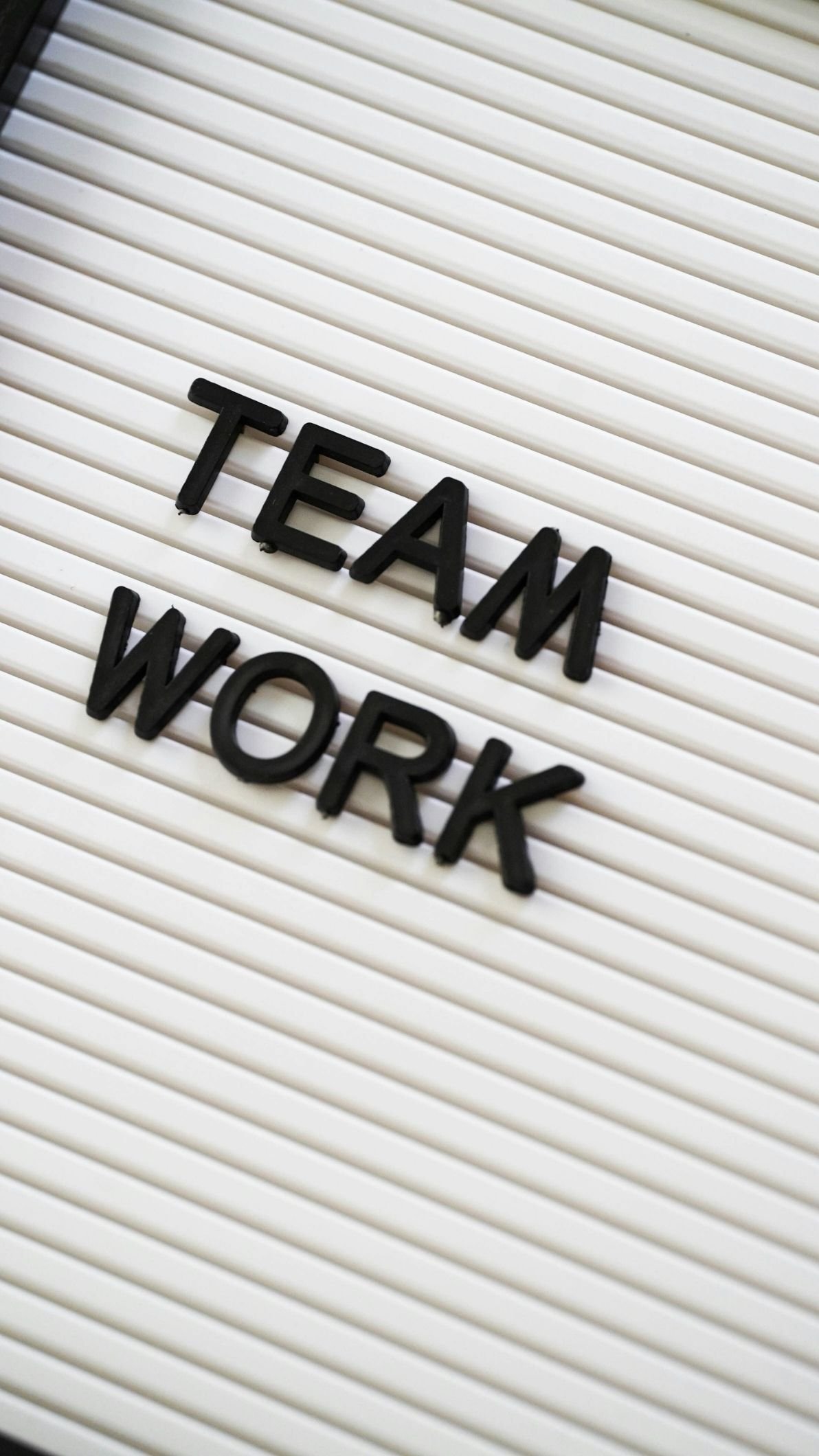 image of a sign that says "teamwork"