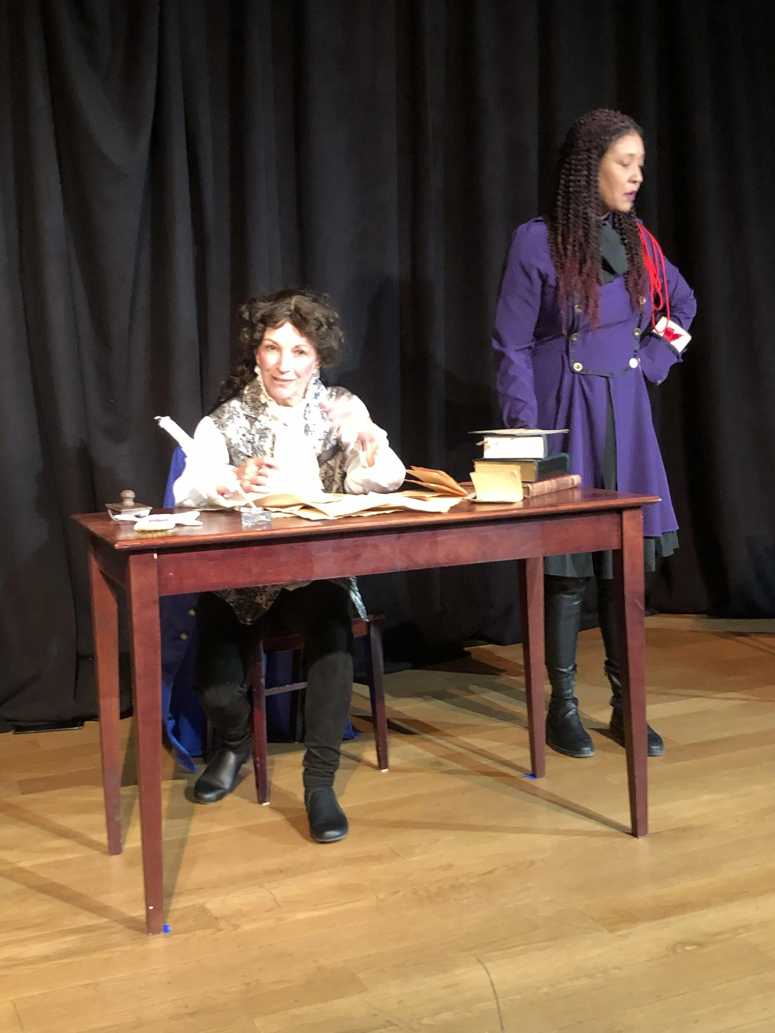  Margaret Casart as **Olympe de Gouges** &amp; Rav’n Moon as **Marianne Angelle**  **Photo by** Lynn Fleming 