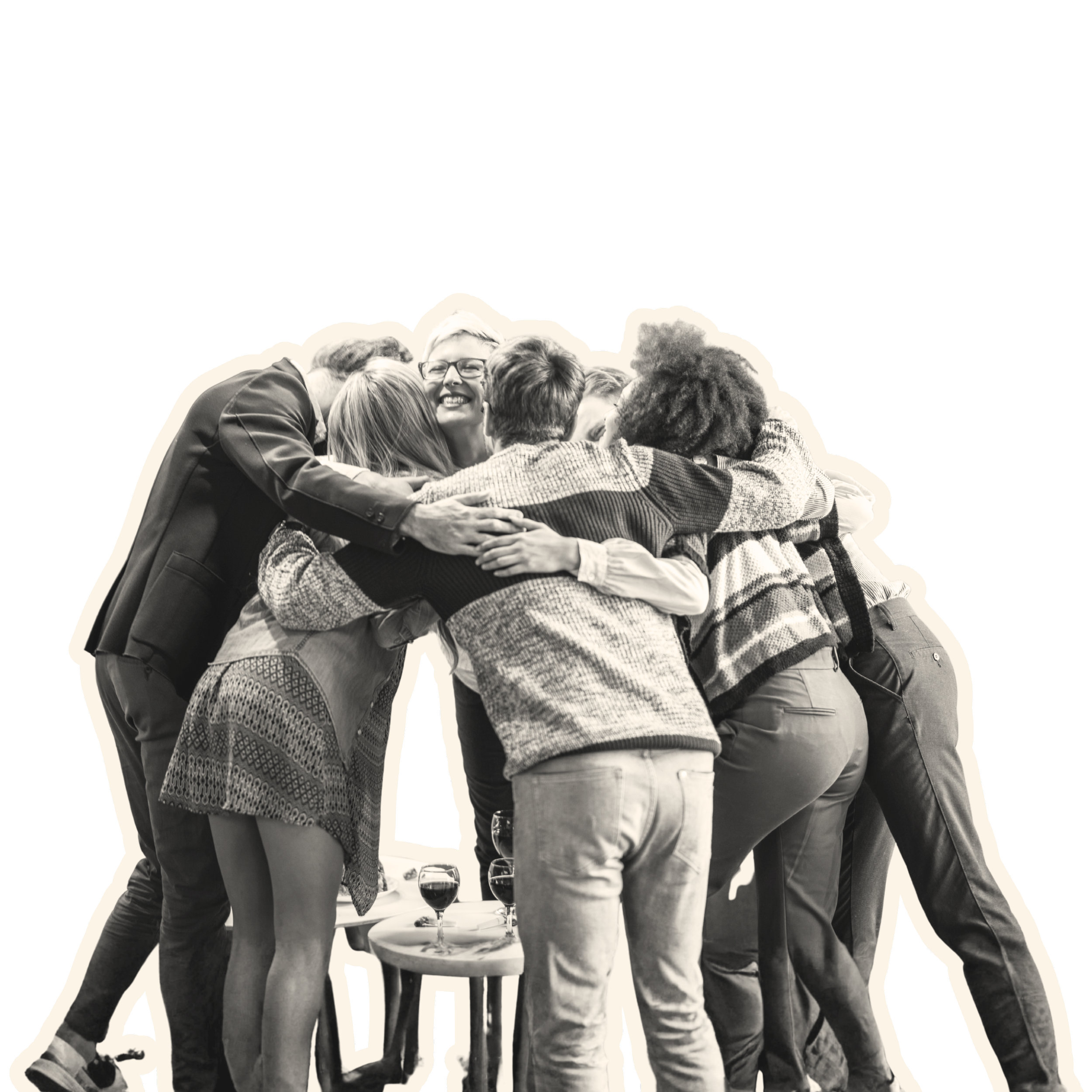Group of people huddled together in a hug