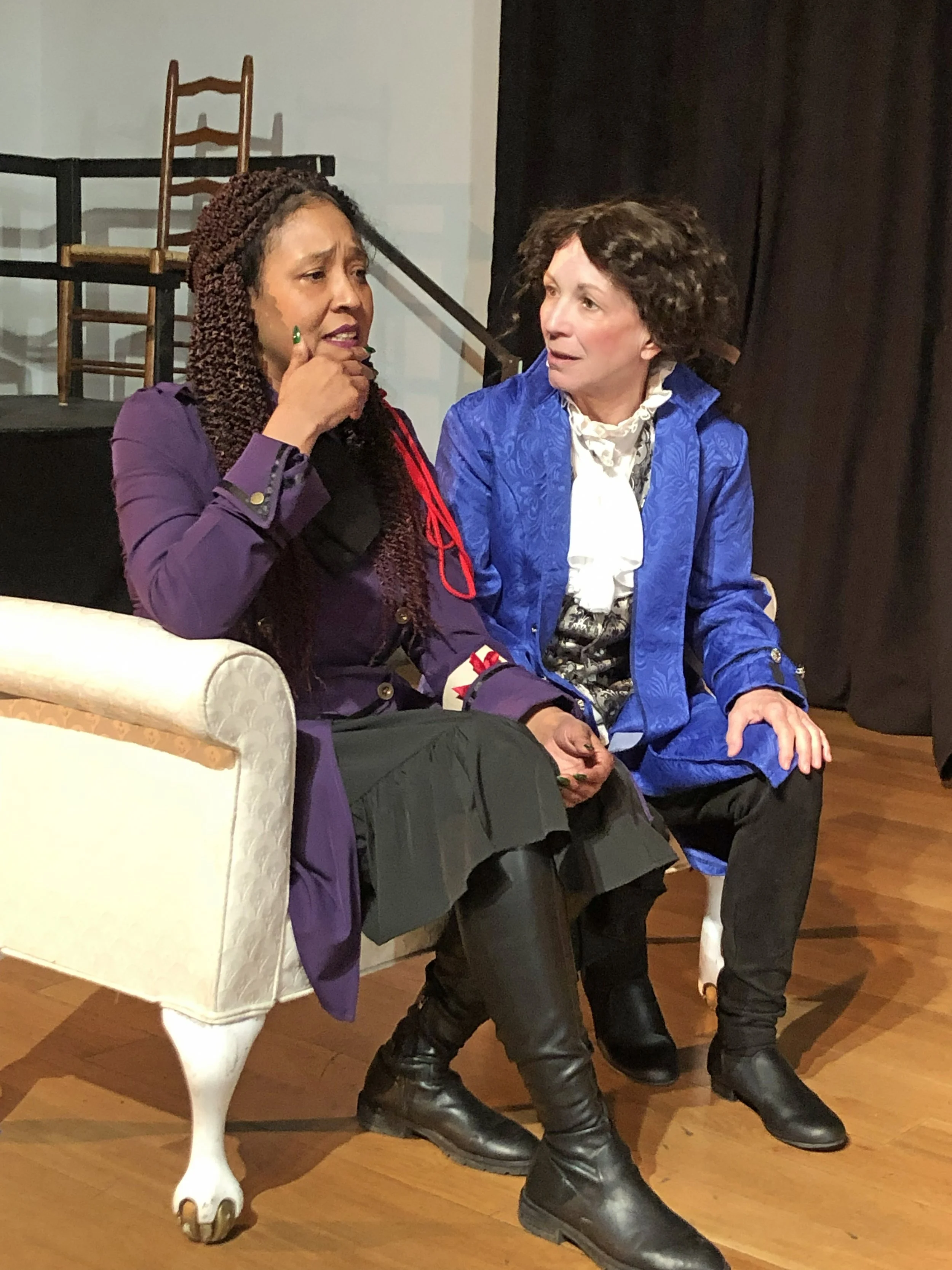  Rav’n Moon as **Marianne Angelle** &amp; Margaret Casart as **Olympe de Gouges**  **Photo by** Lynn Fleming 