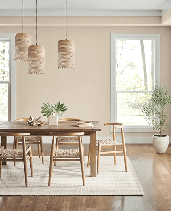 Dining room wall painted with Accessible Beige by Sherwin-Williams