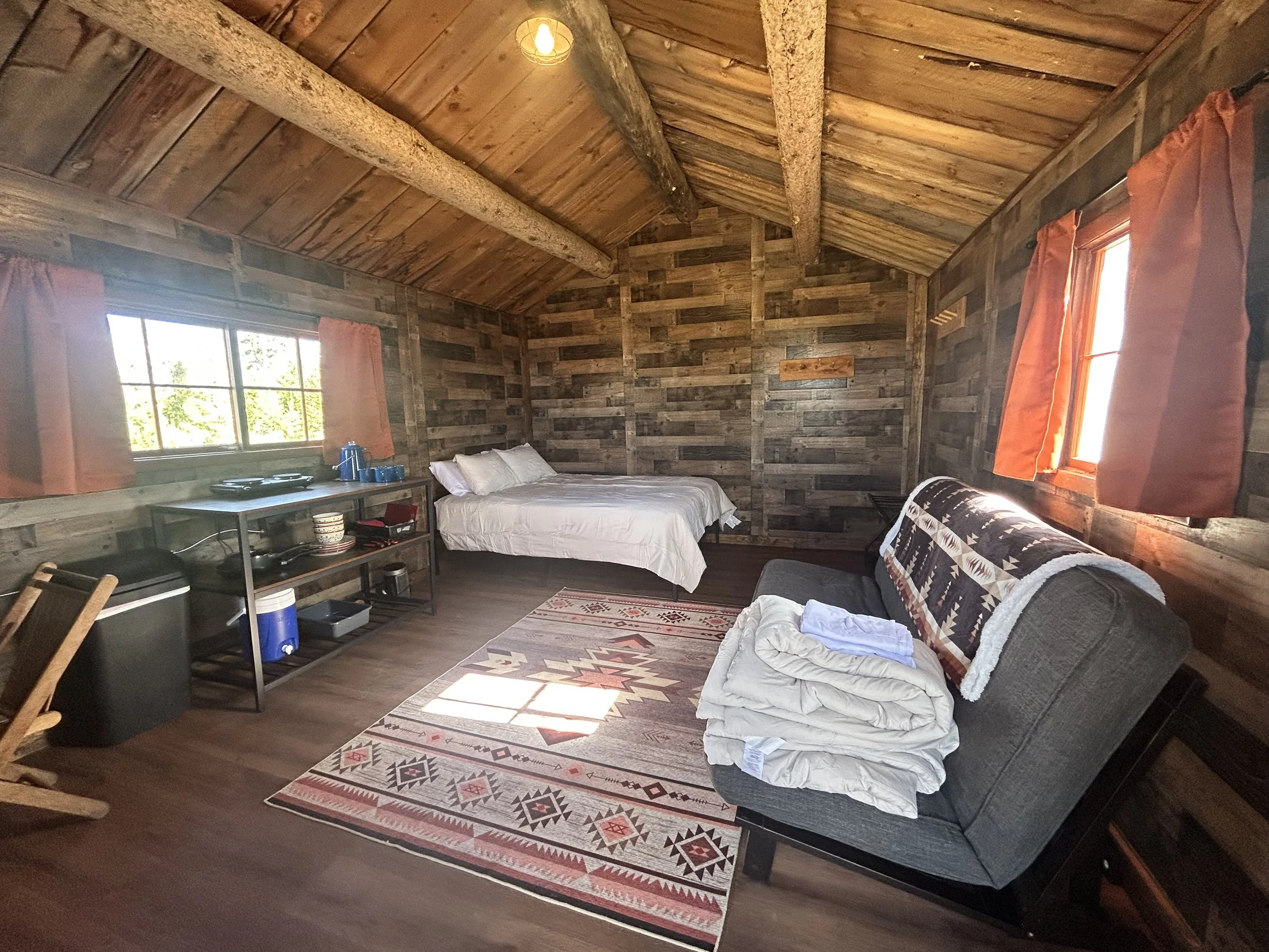 Cabin 10 Interior - Queen bed and futon
