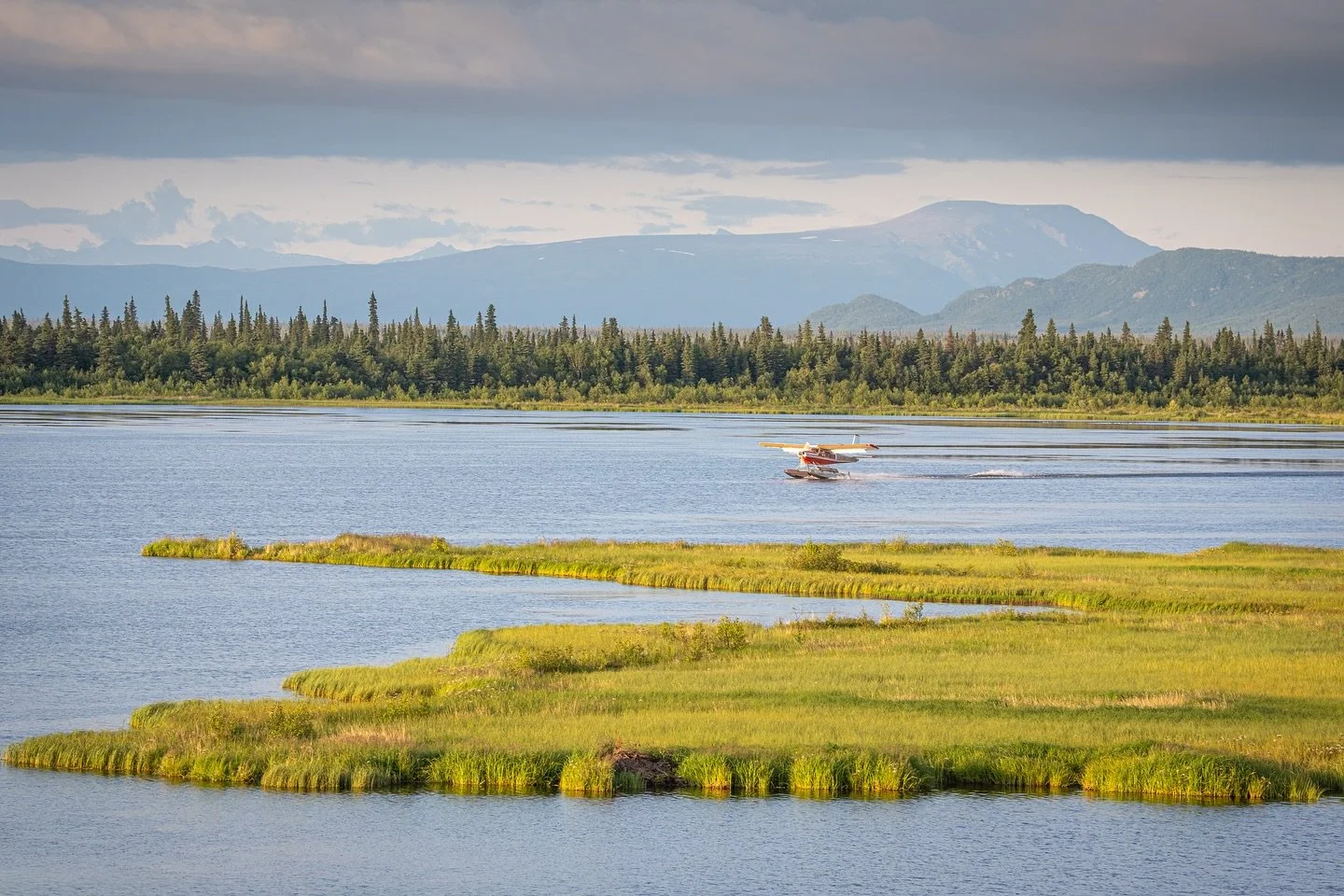 Evening light on Olga Lake and the sound of the Helio landing&mdash; the heartbeat of our little corner of katmai. 

@angler_untangler heads in across the water, doing what he does best: flying more lumber into the wildest, most beautiful backyard we