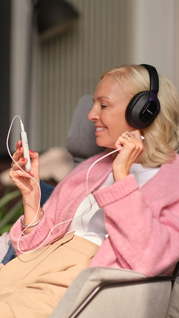 Person using Lenire tinnitus treatment