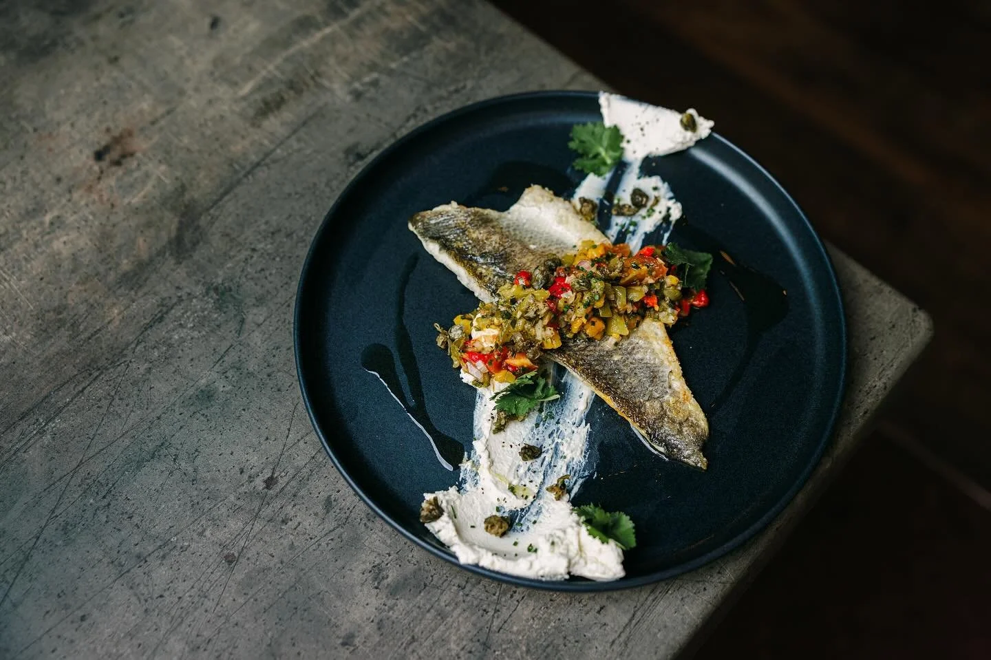 Sea bass, with labneh and charred bell pepper, tomato, lime and coriander salsa 🎣

Not forgetting a side of courgettes, tzatziki and roasted tomatoes