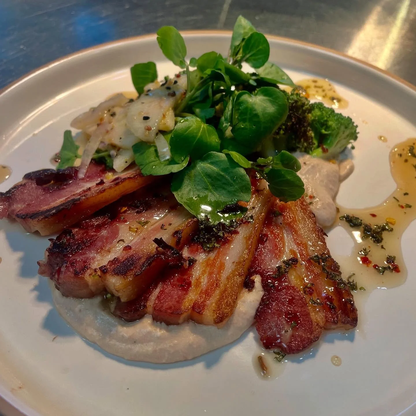 Someones been working a little magic behind the scenes.. new specials on the pass tomorrow❗️

Roasted pork belly of bacon, celeriac &amp; bean pur&eacute;e, broccoli, watercress apple cider salad, mint chilli honey glaze 

Jersey crab salad, lobster 