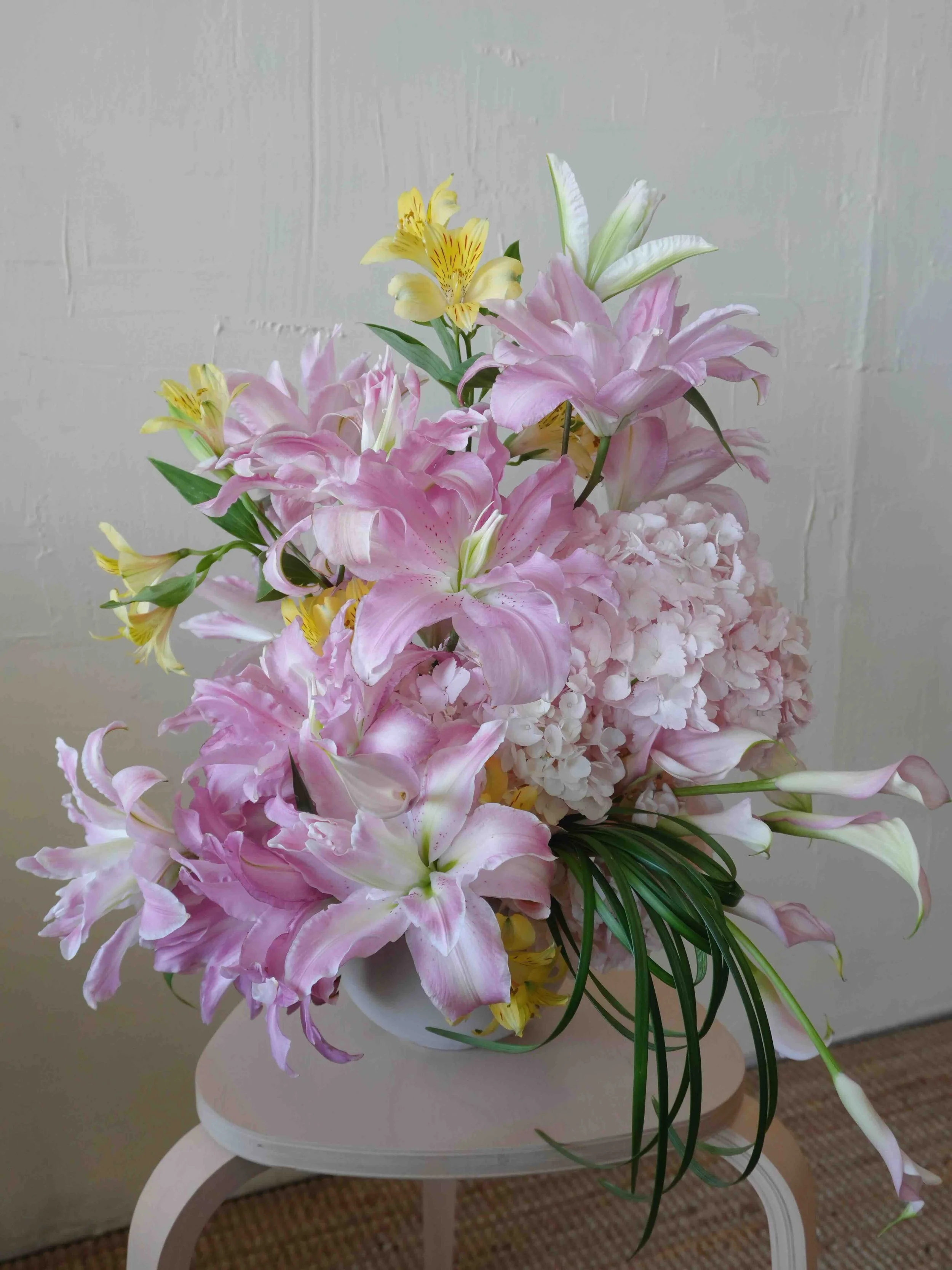 Girl and the Flower_Lilies Calla Lilies_Flower Arrangements.jpeg
