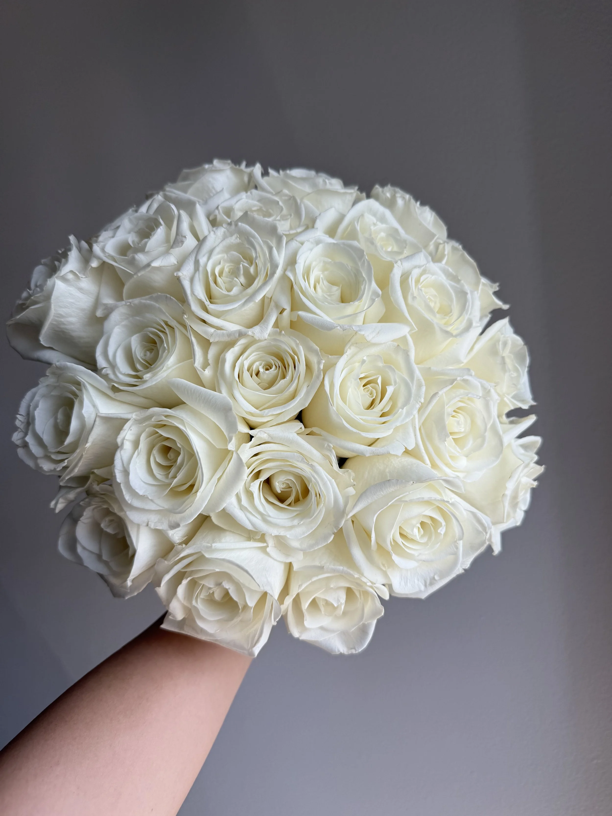 rounded shape white roses