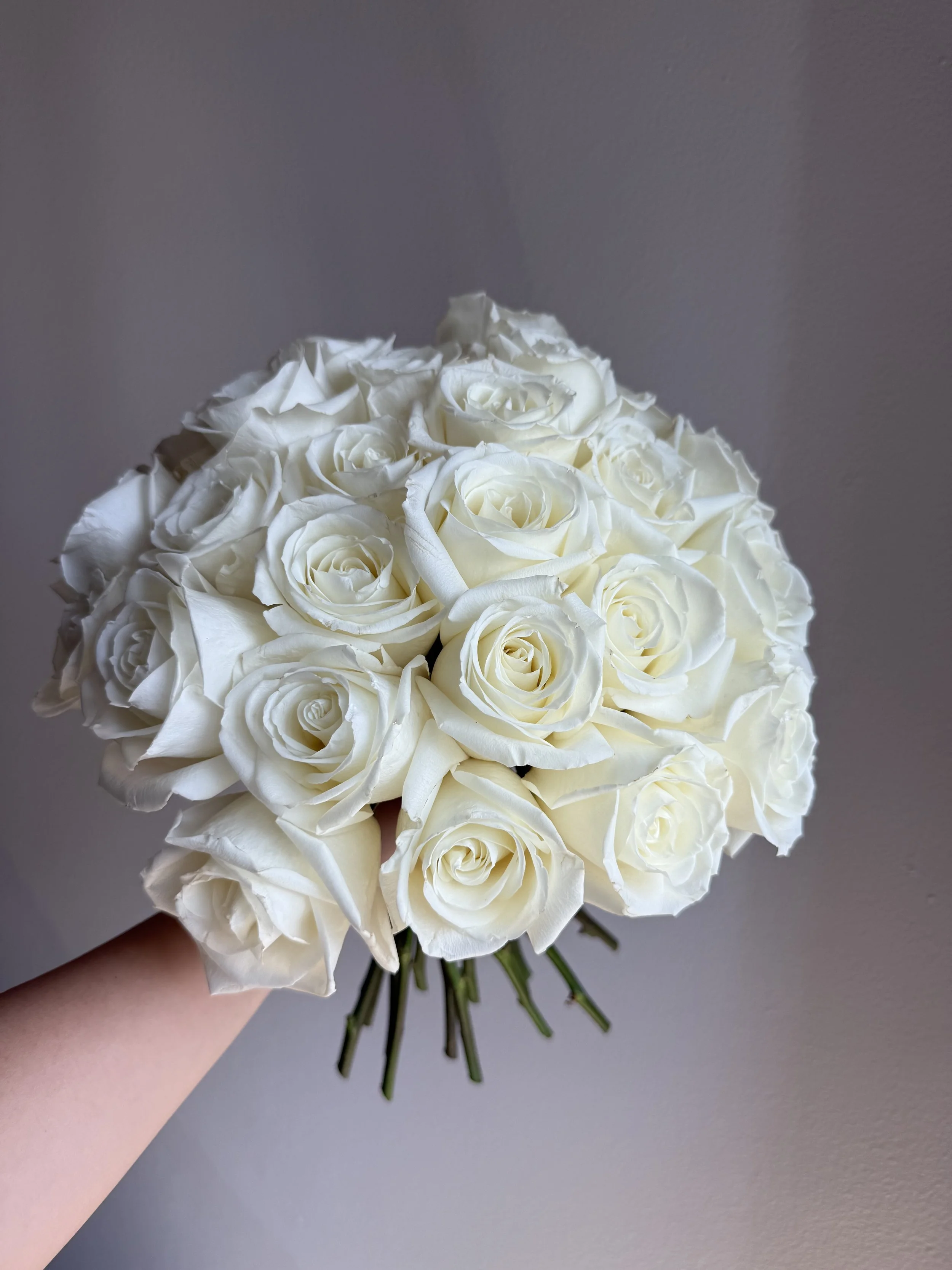 rounded shape white roses