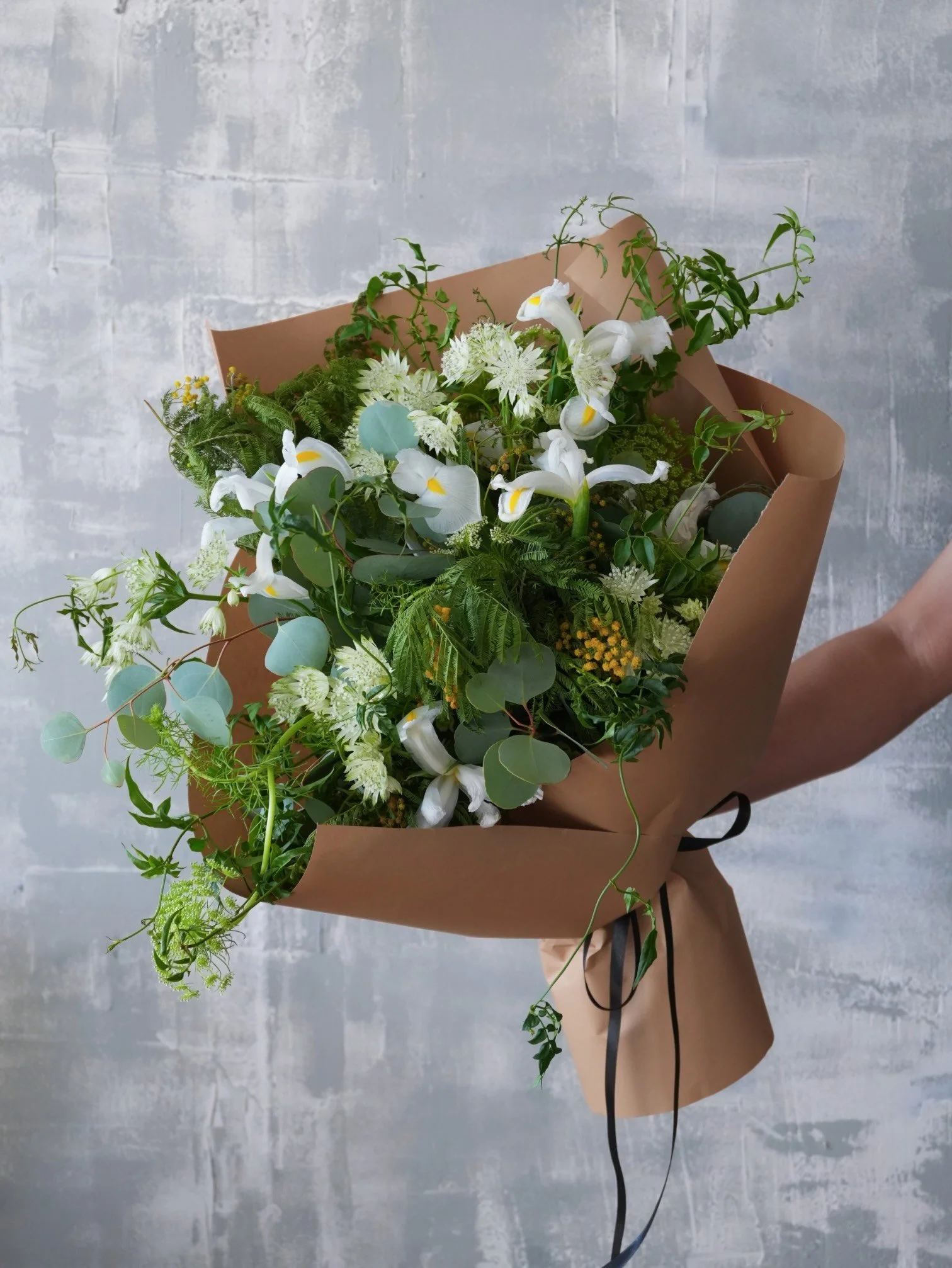 Hand-Tied Garden Bouquet with White Irises and Greens.jpeg