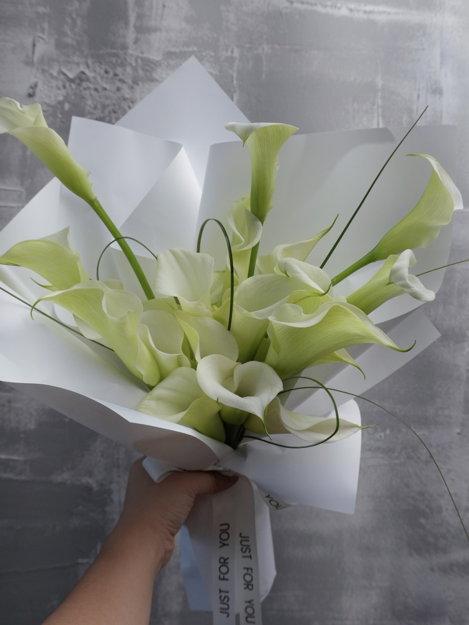 Contemporary White Calla Lily Bouquet.jpeg