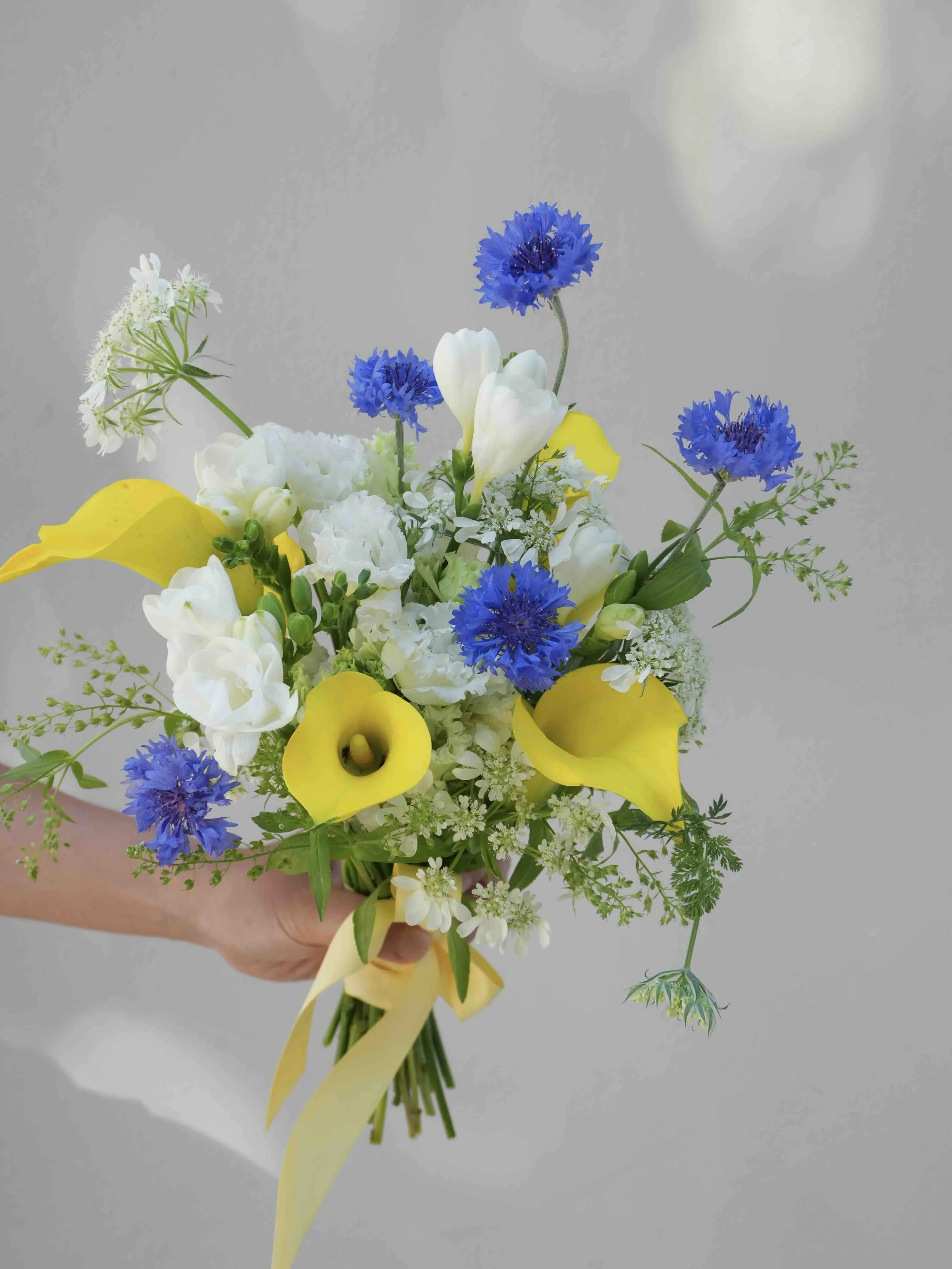 Girl and the Flower_ucla graduation bouquet.jpeg