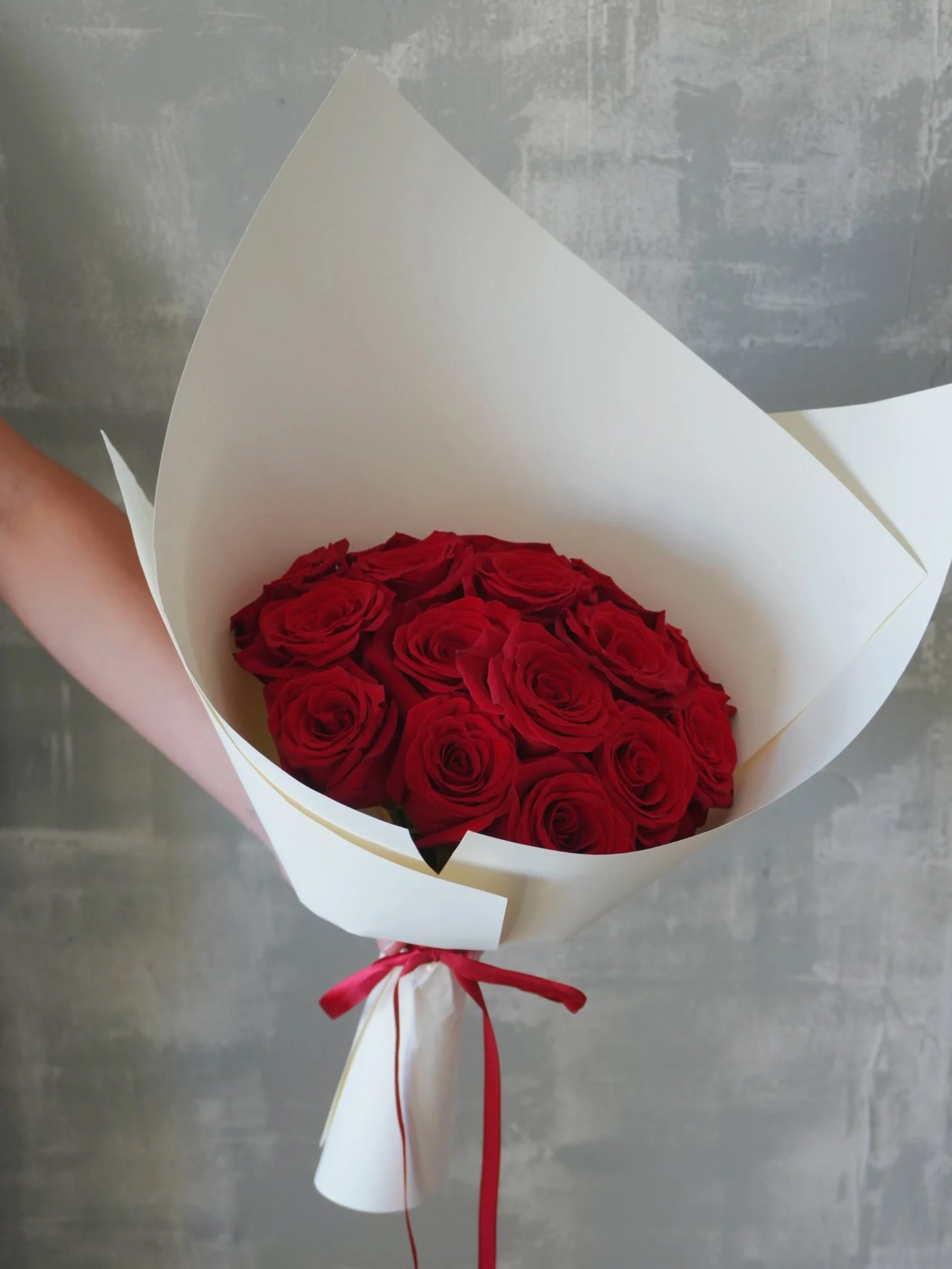 Classic red roses hand-tied bouquet.jpeg
