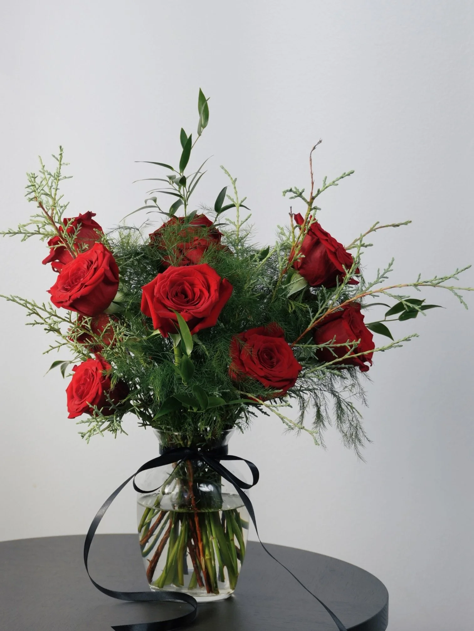 Classic Red Rose Arrangement in Clear Vase.jpeg