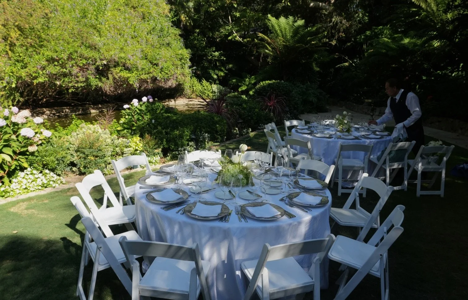 G&F-Green and white floral centerpiece for a private dinner.jpeg