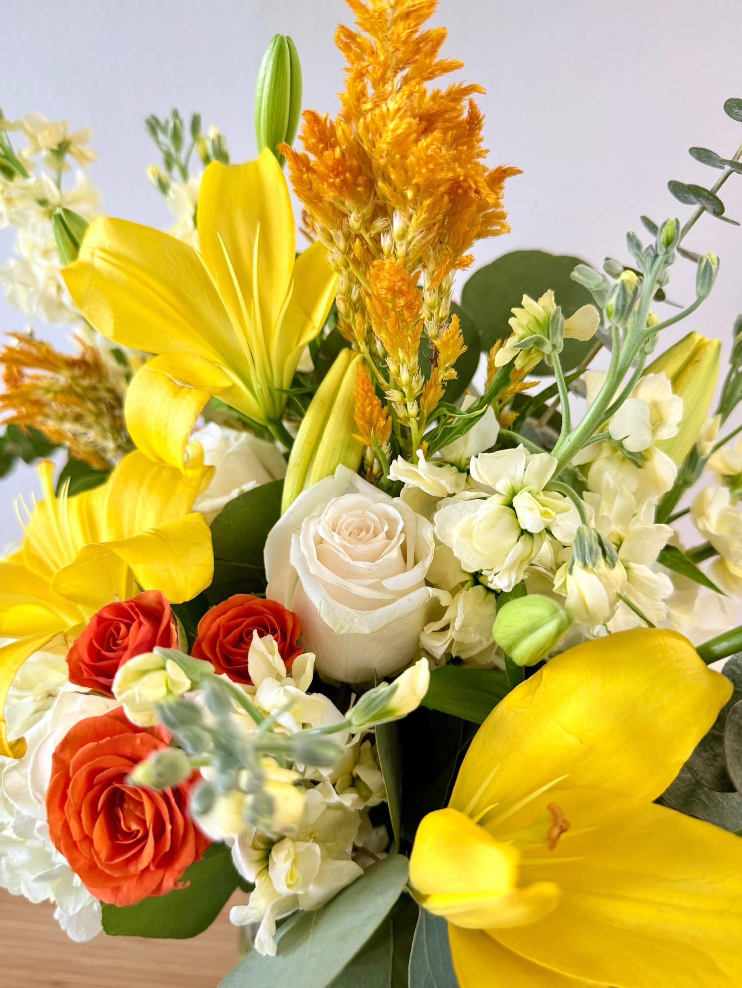 Joyful yellow and white floral arrangement featuring lilies and hydrangea — DTLA flower delivery.jpeg