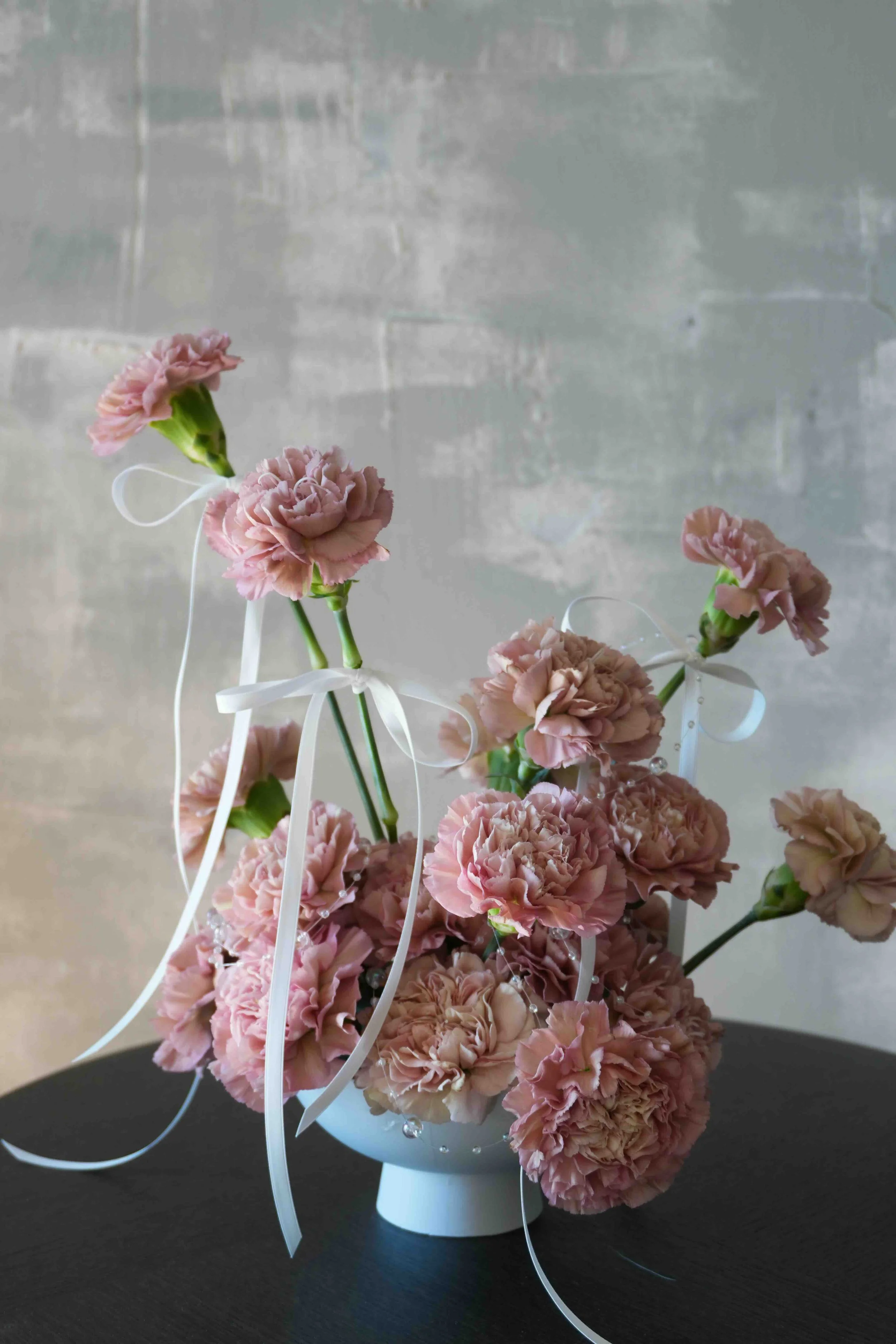 Girl and the Flower-carnation arrangements.jpeg