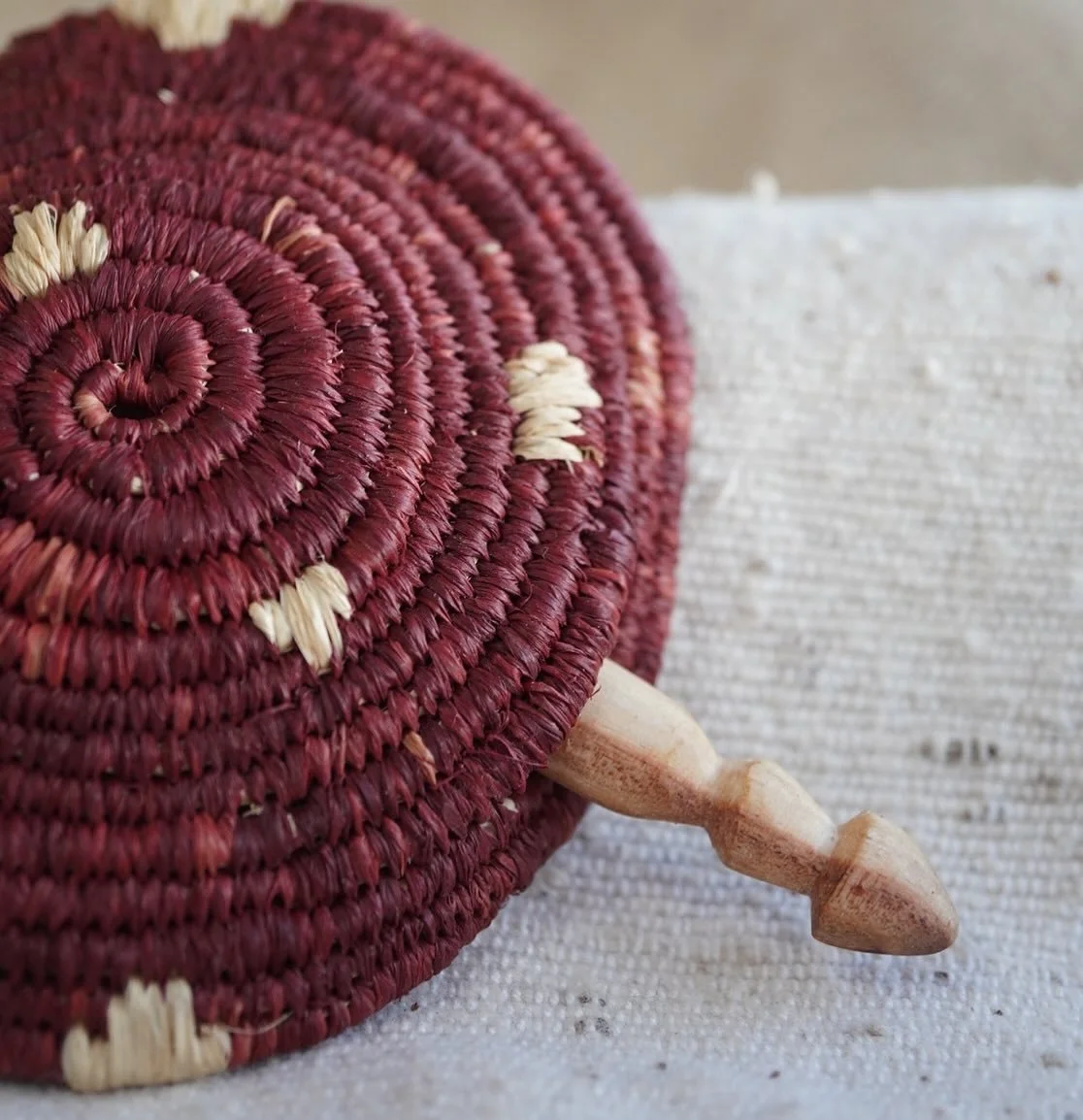 A little mushroom carved into the end of a hair pin made from wood we collected many moons ago while camping in Victoria. 
A woven hair piece inspired by the amanita mushroom, raffia dyed with Lac which is actually made from insects. 
All in all an a