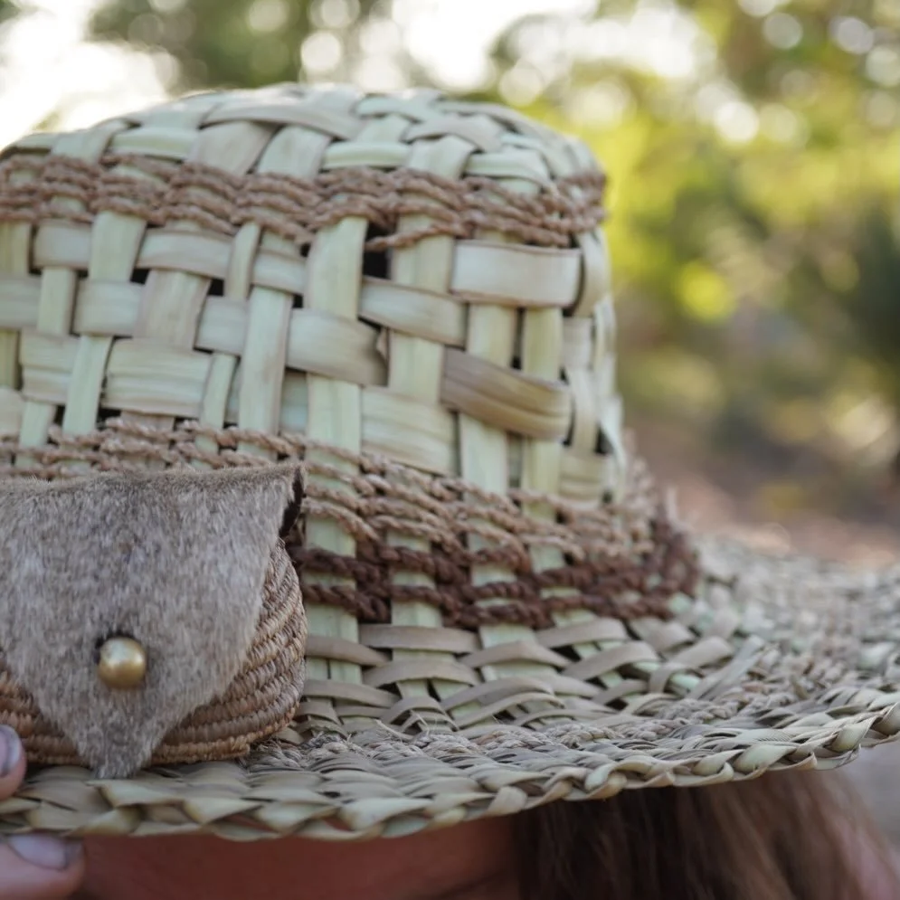 I spy a special basket adorned with hand tanned kangaroo tail and brass bead.
Pairs nicely with my pandanus hat I made while travelling the Gibb river road WA.