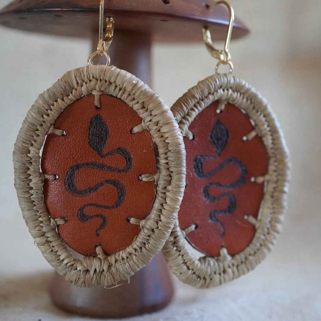 Fallen in love with burning into leather off cuts. 
Snakes have been my favourite thing to draw but I have a few different designs in mind ✨
Even though they are large they are super light and comfortable to wear.